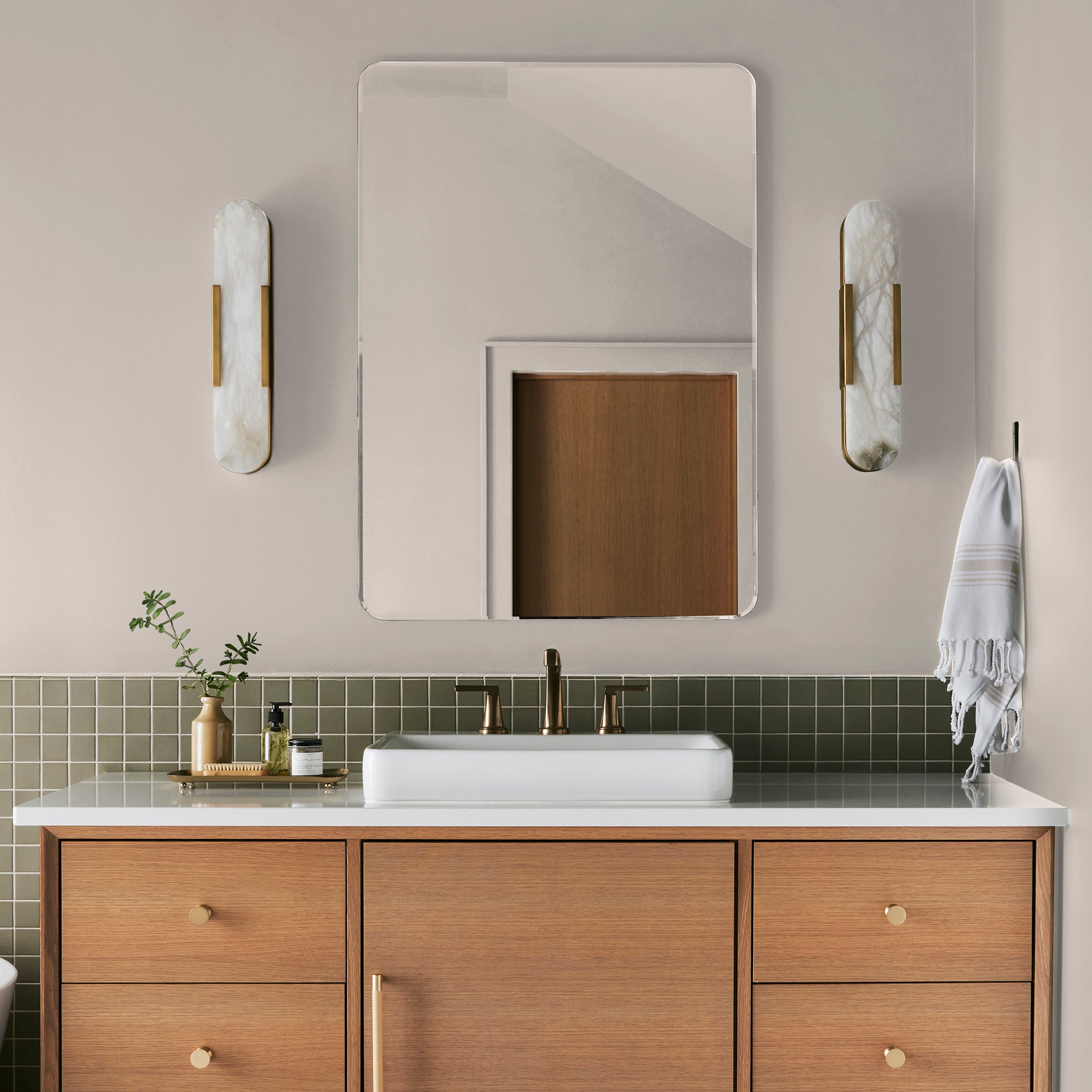 ivory with pink undertones interior paint named antique rose shown painted on bathroom wall