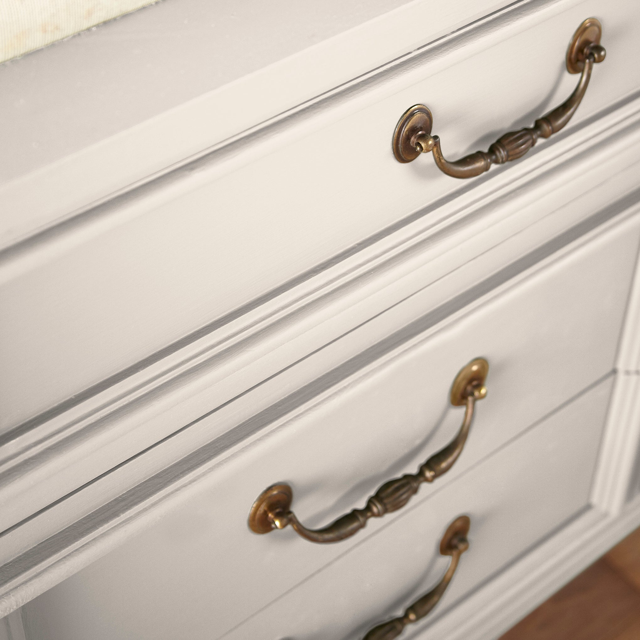 ivory with pink undertones paint named antique rose shown painted on cabinet
