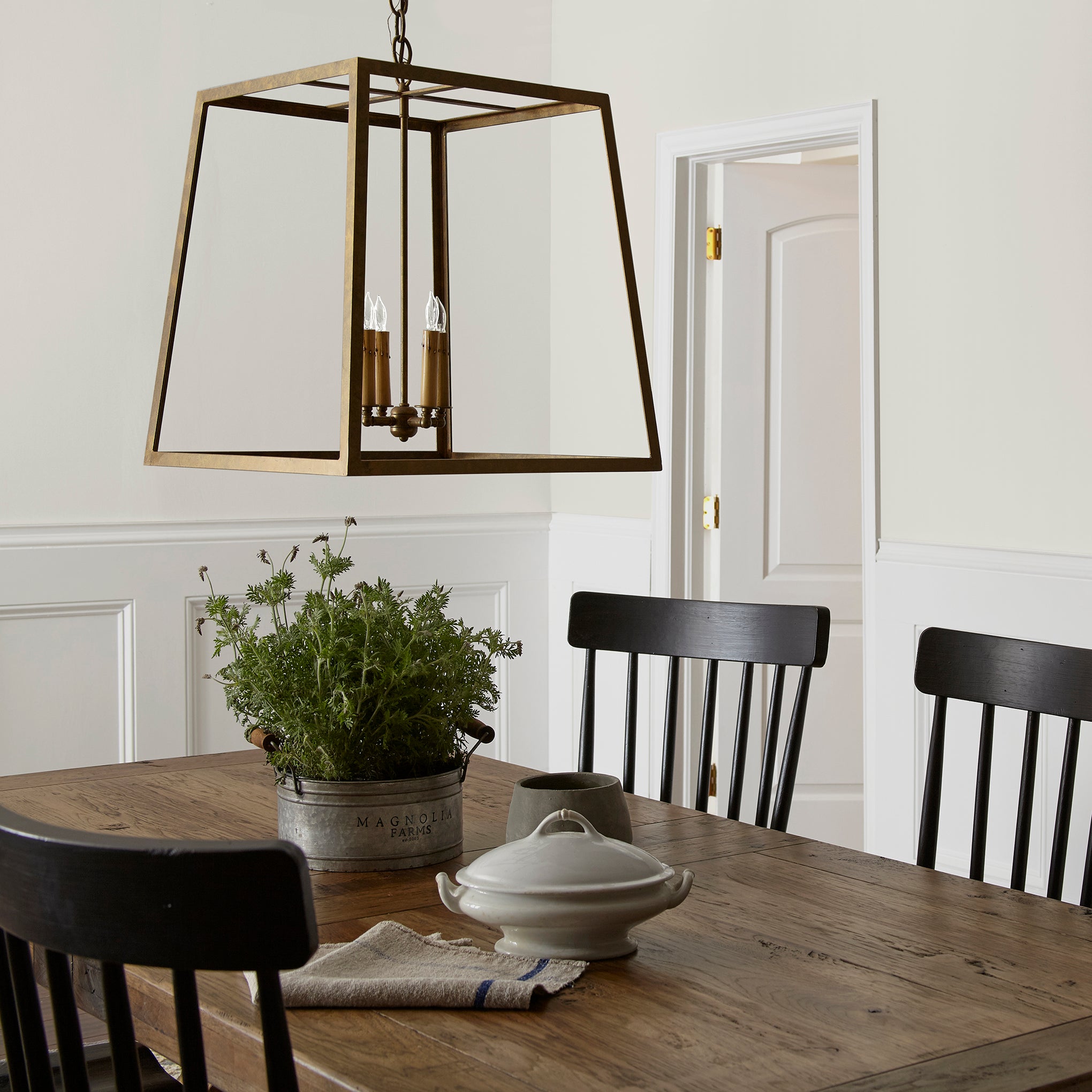 creamy weathered white interior paint named shiplap shown painted on dining room wall