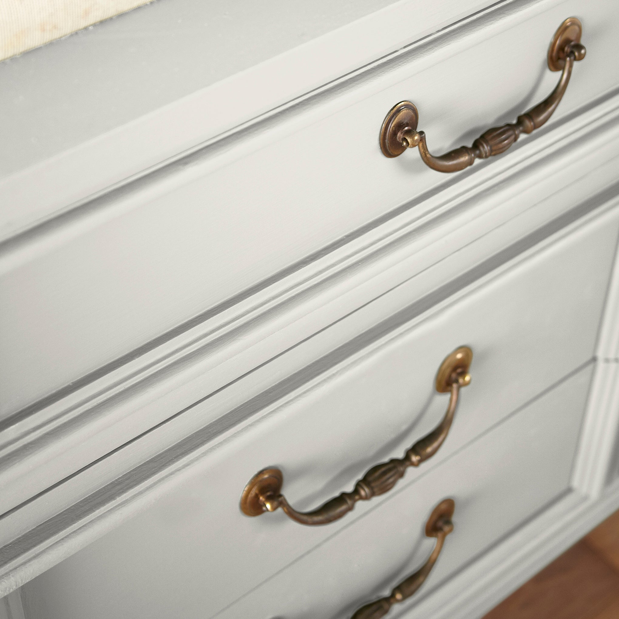 creamy off-white paint  named shiplap shown painted on cabinet