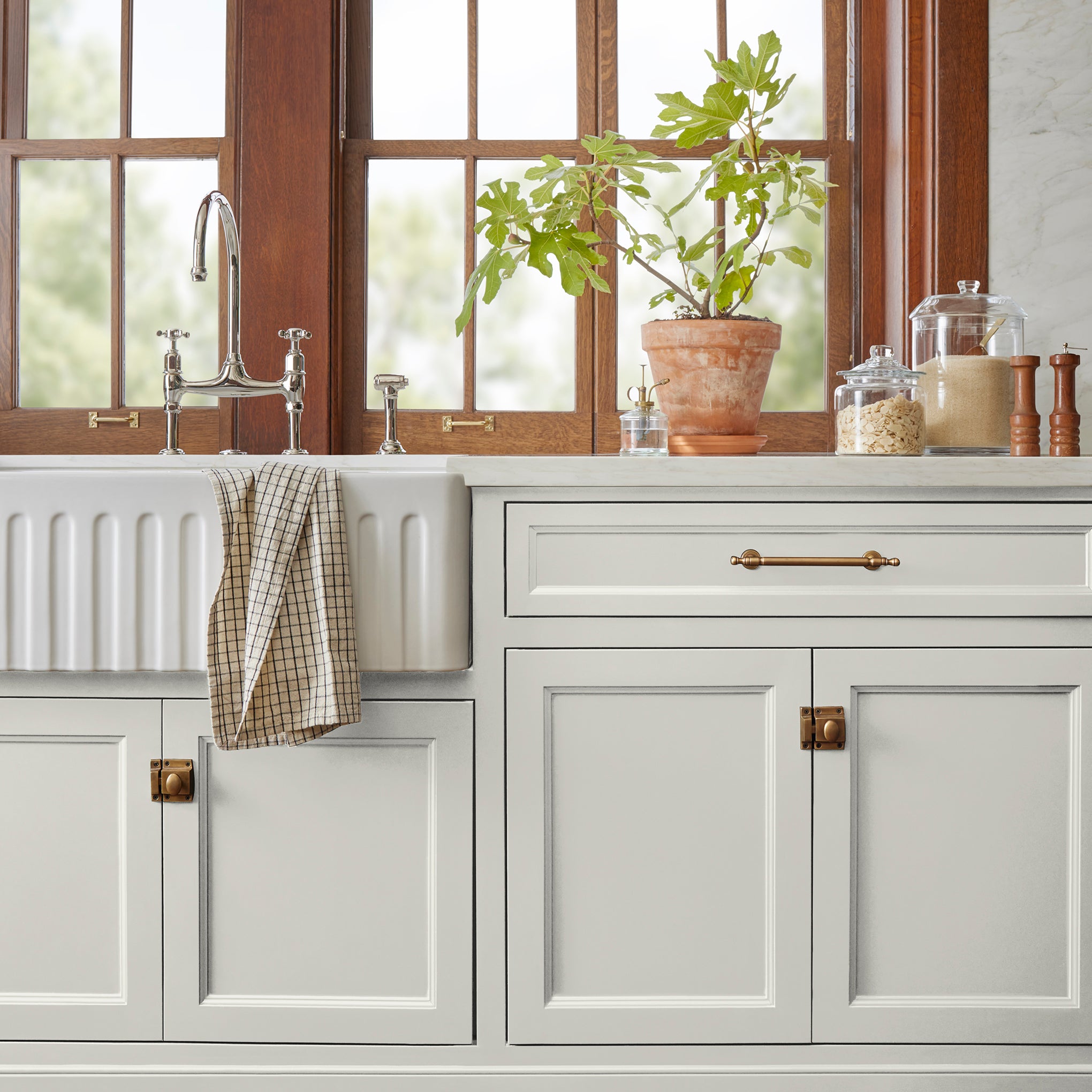creamy off-white paint  named shiplap shown painted on  kitchen cabinet