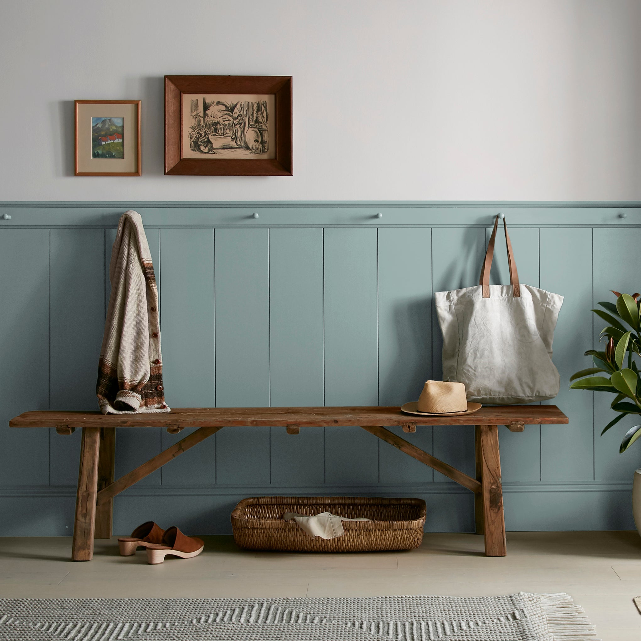 medium grey-aqua blue interior paint named sir drake shown painted on entryway wall