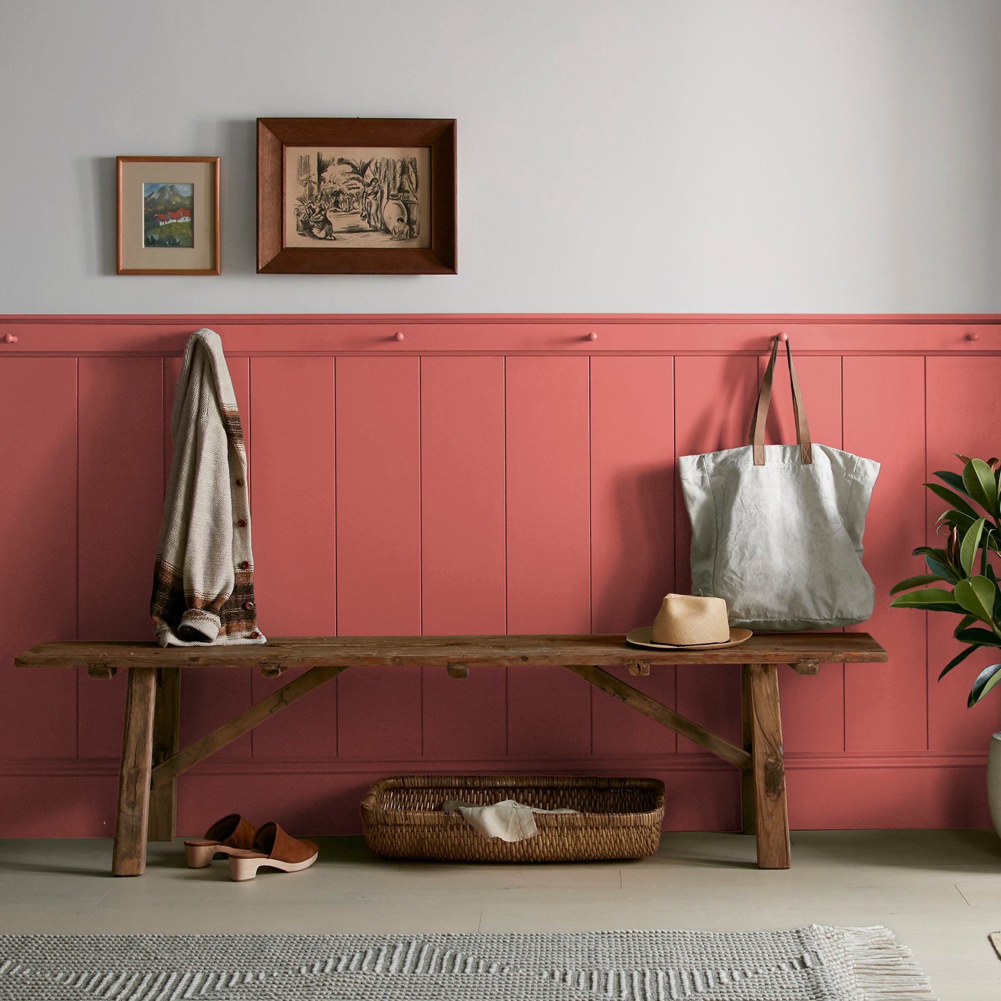 vibrant red with orange undertones interior paint named ripened tomato shown painted on entryway wall