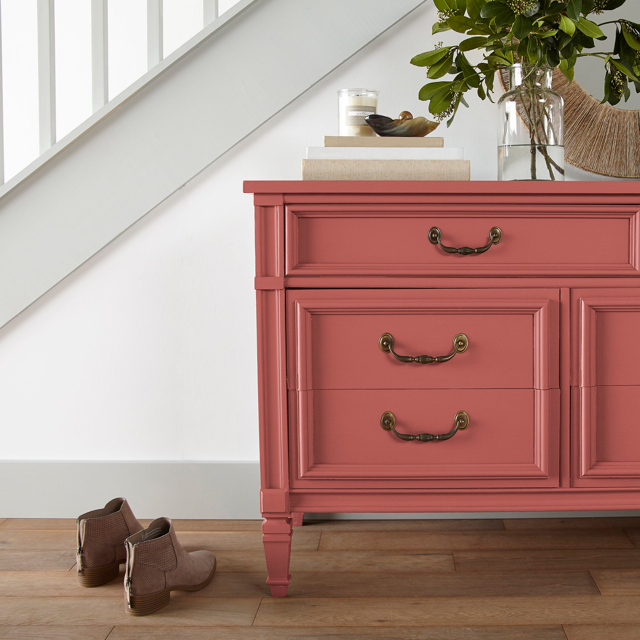 tomato red paint named vine ripened tomato shown painted on entryway cabinet