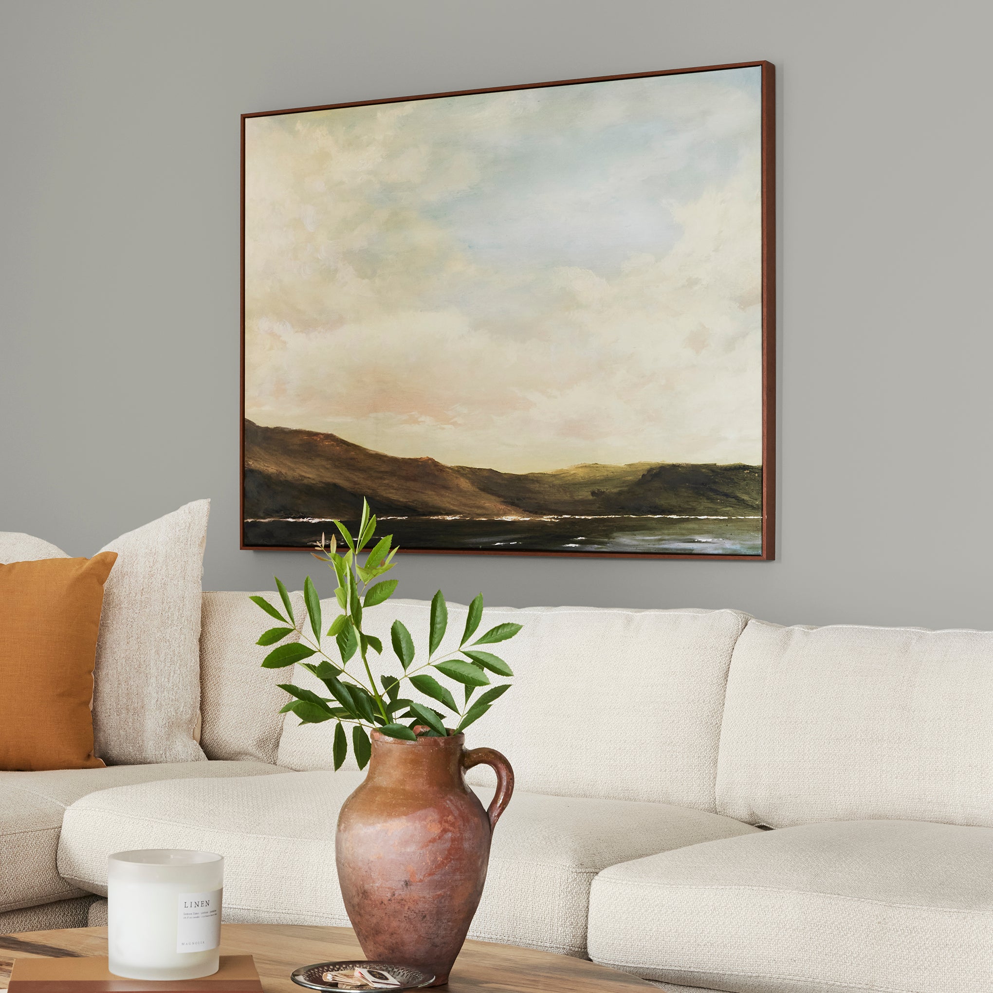 pure grey with a tan undertone interior paint named cupola shown painted on living room wall