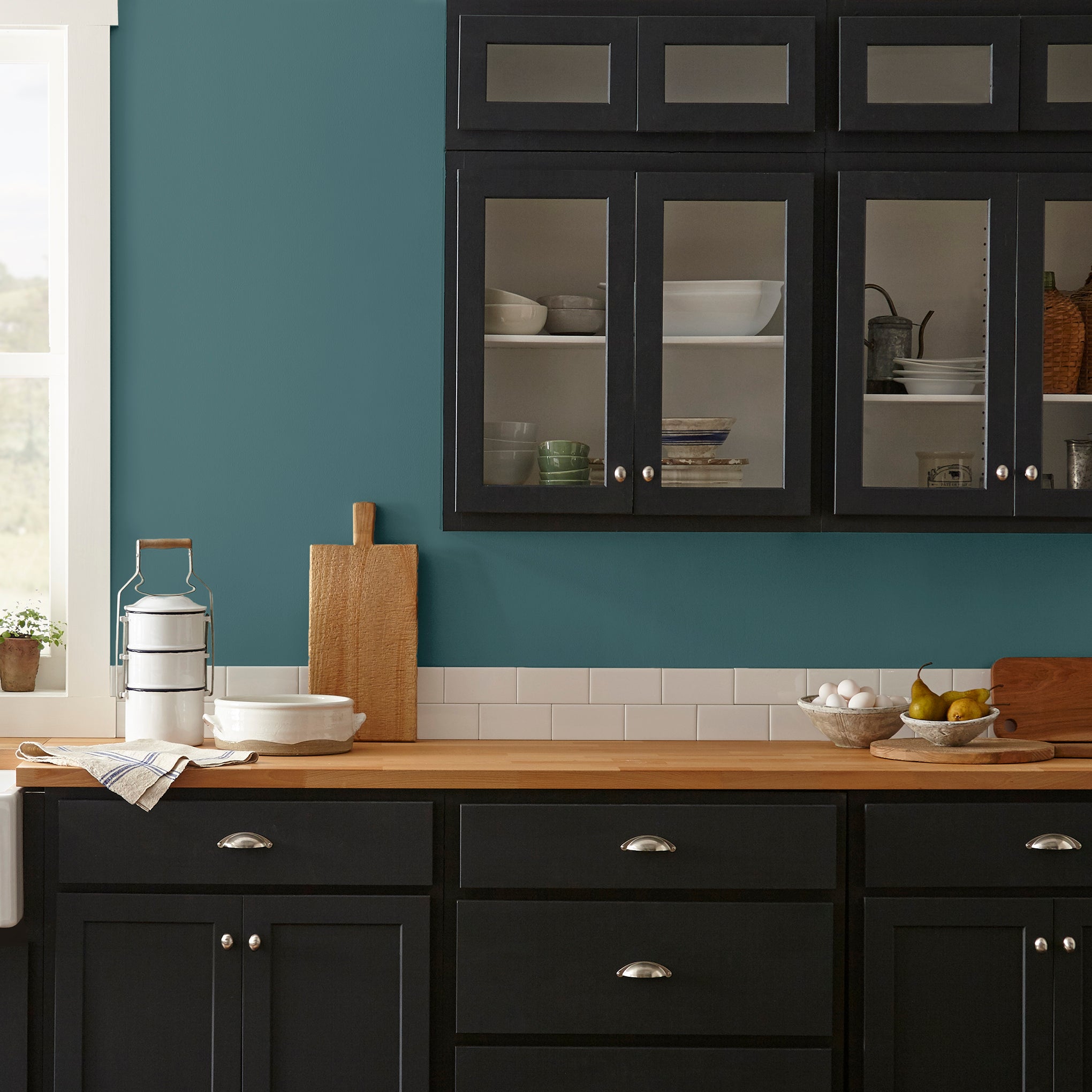 dark denim blue interior paint named weekend shown painted on kitchen wall