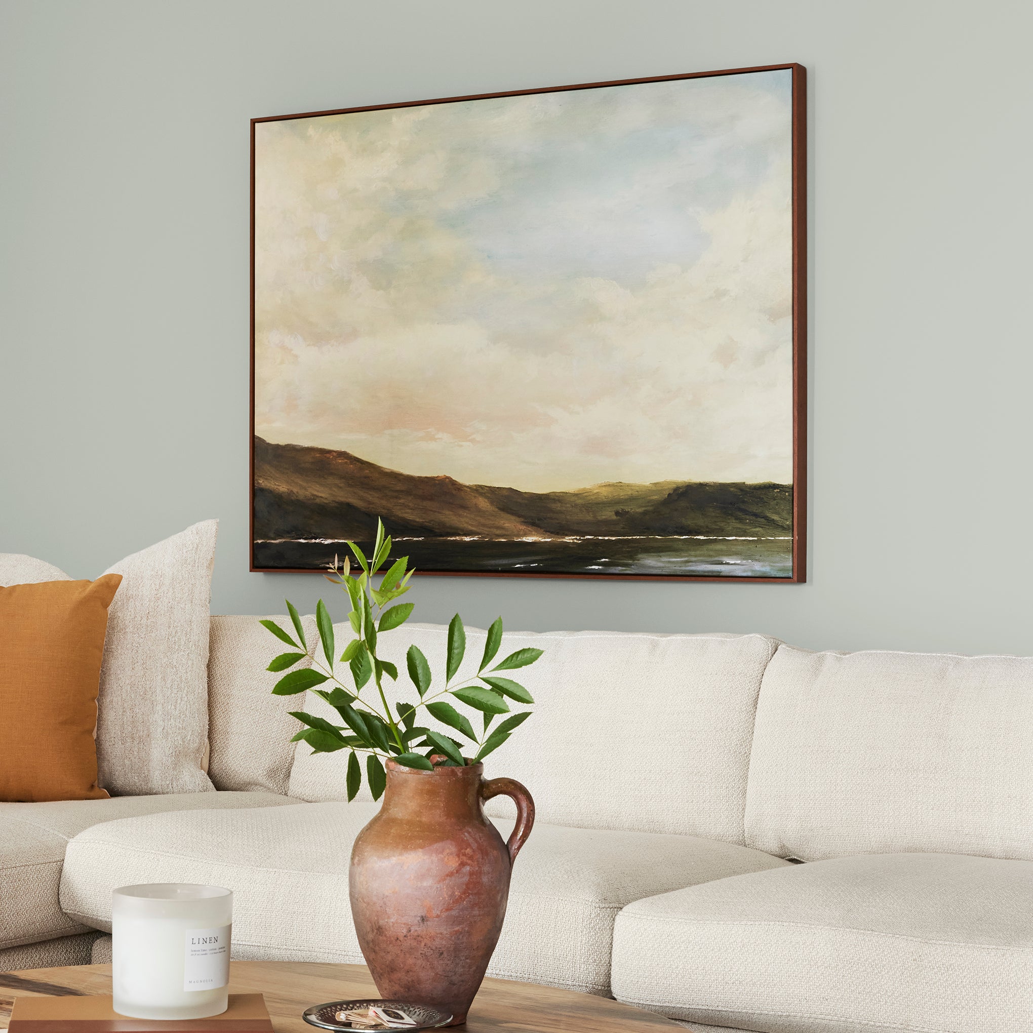 light blue grey with light green undertone interior paint named emmies room shown painted on living room wall