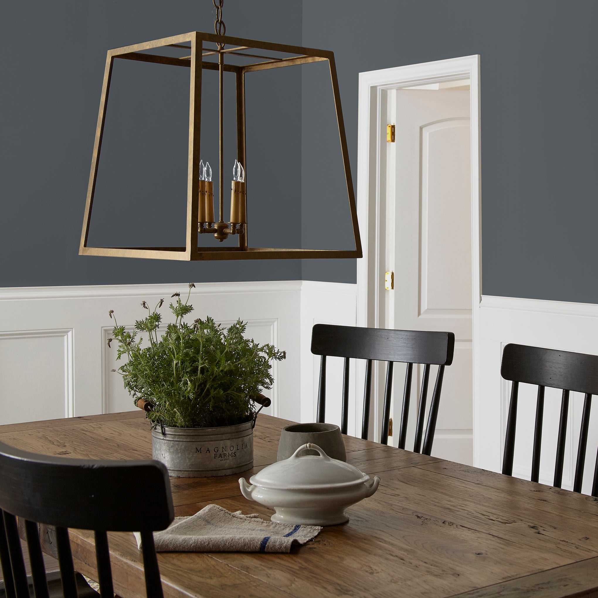 dark chalkboard black with blue undertones paint named blackboard shown painted on dining room wall
