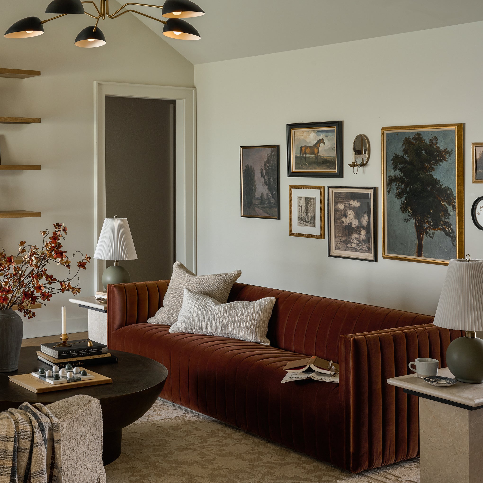 Equestrian Study on a gallery wall above a sofa