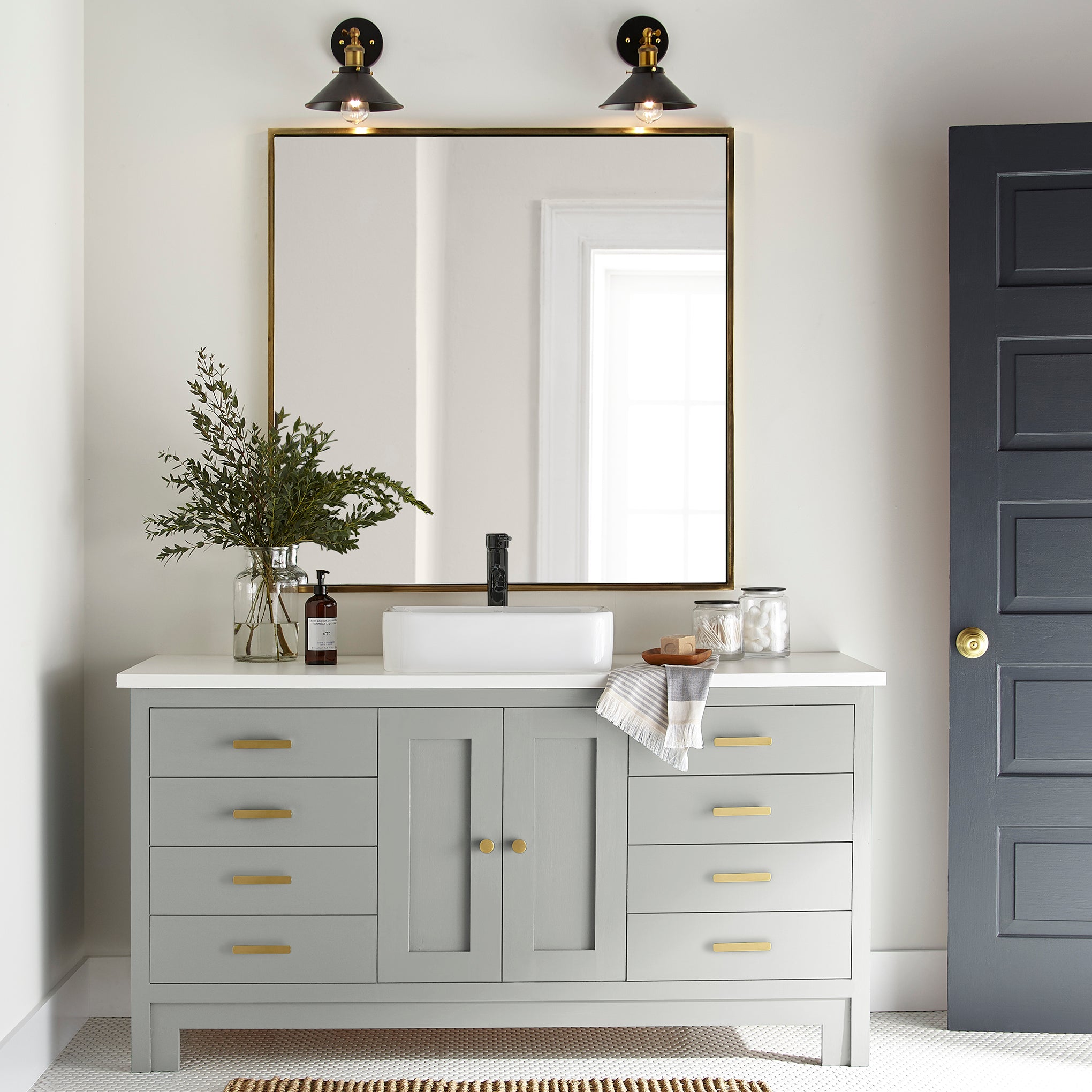Silver gray tinted with sky blue door and cabinet paint named wedding band shown painted on  bathroom cabinet