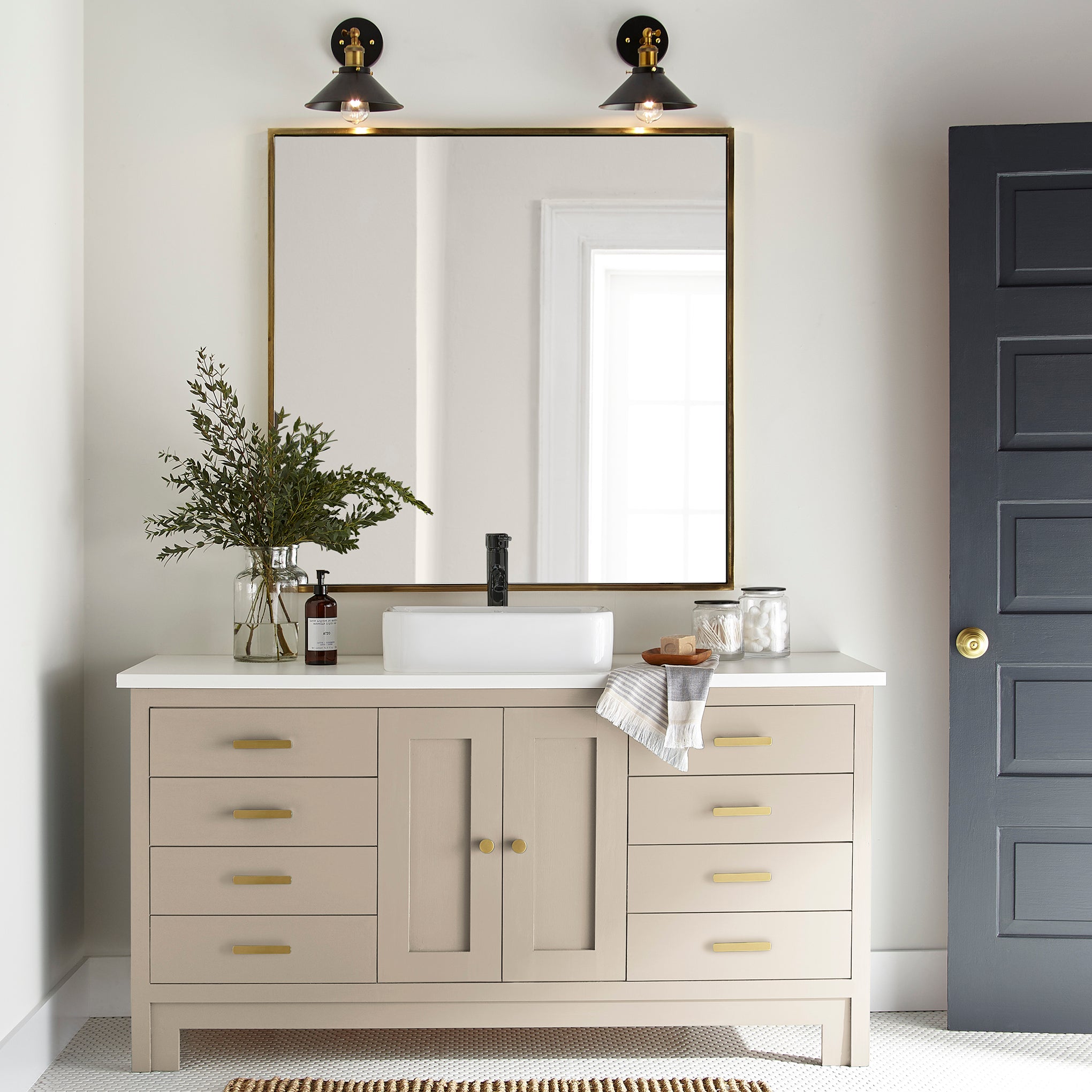 light tan with a yellow undertone door and cabinet paint named soft landing show painted on bathroom cabinet 
