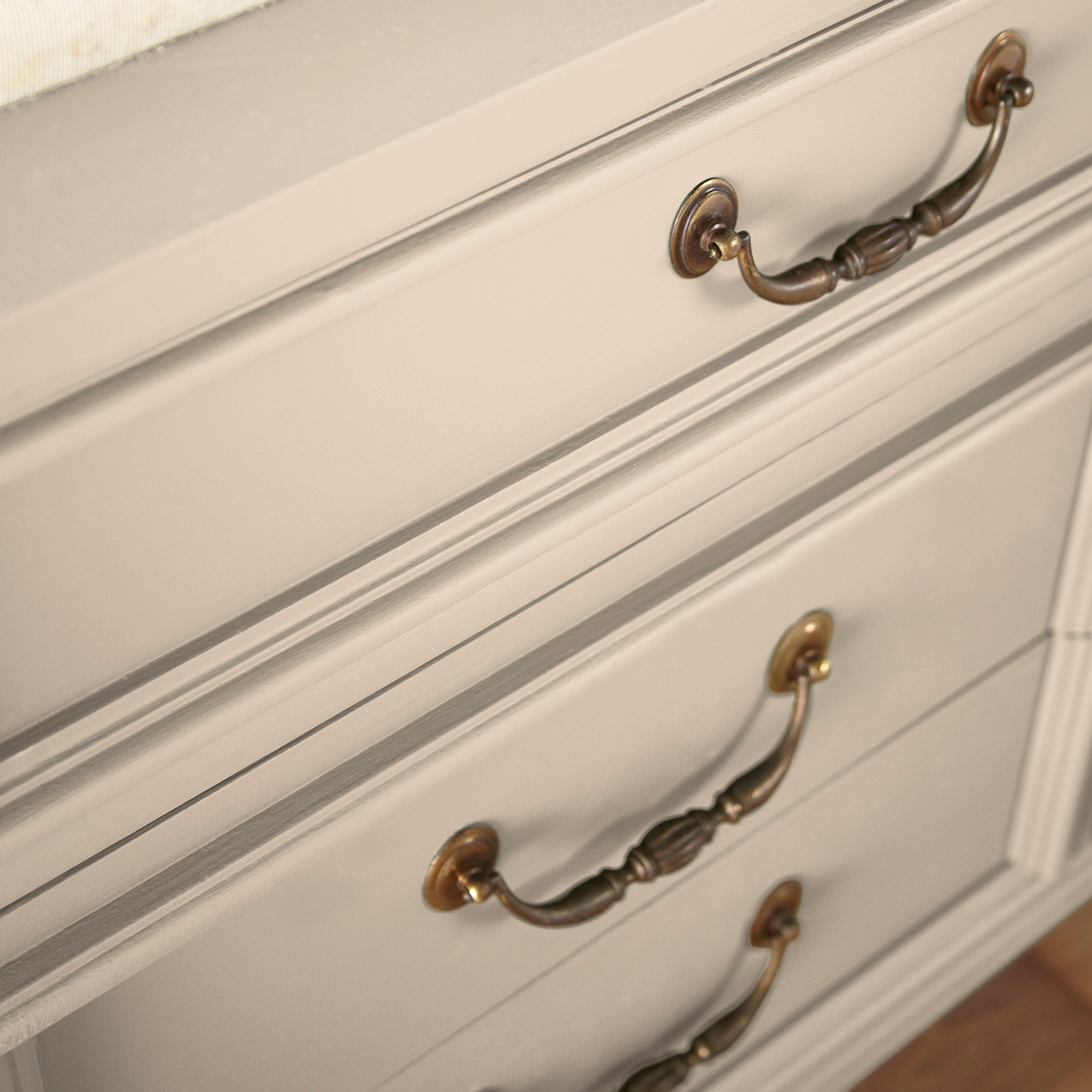 light tan with a yellow undertone door and cabinet paint named soft landing show painted on cabinet 