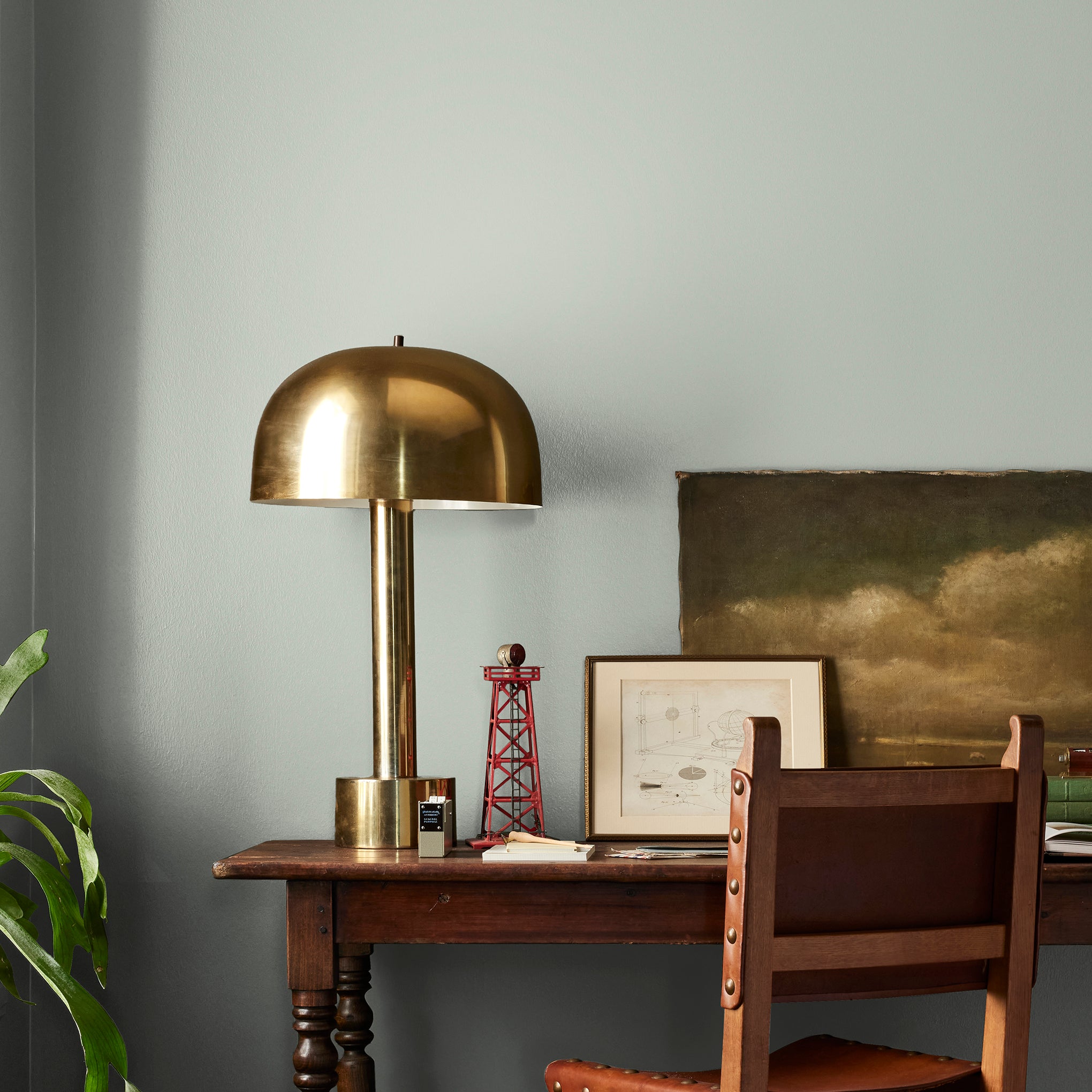 medium grey with cool green blue undertones paint name americana egg shown painted on bedroom wall