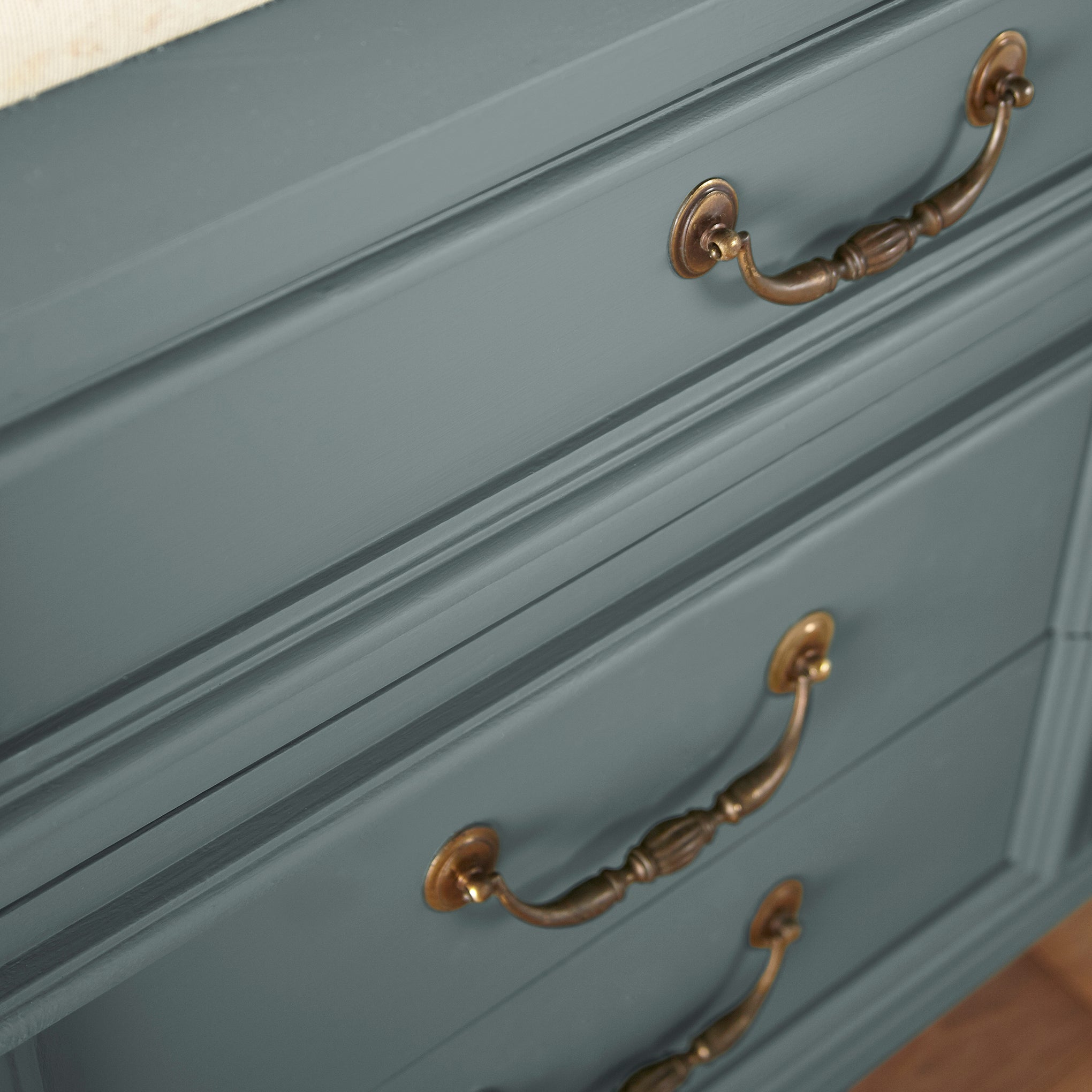 deep muted blue with grey undertones door and cabinet paint named duke gray shown painted on cabinet