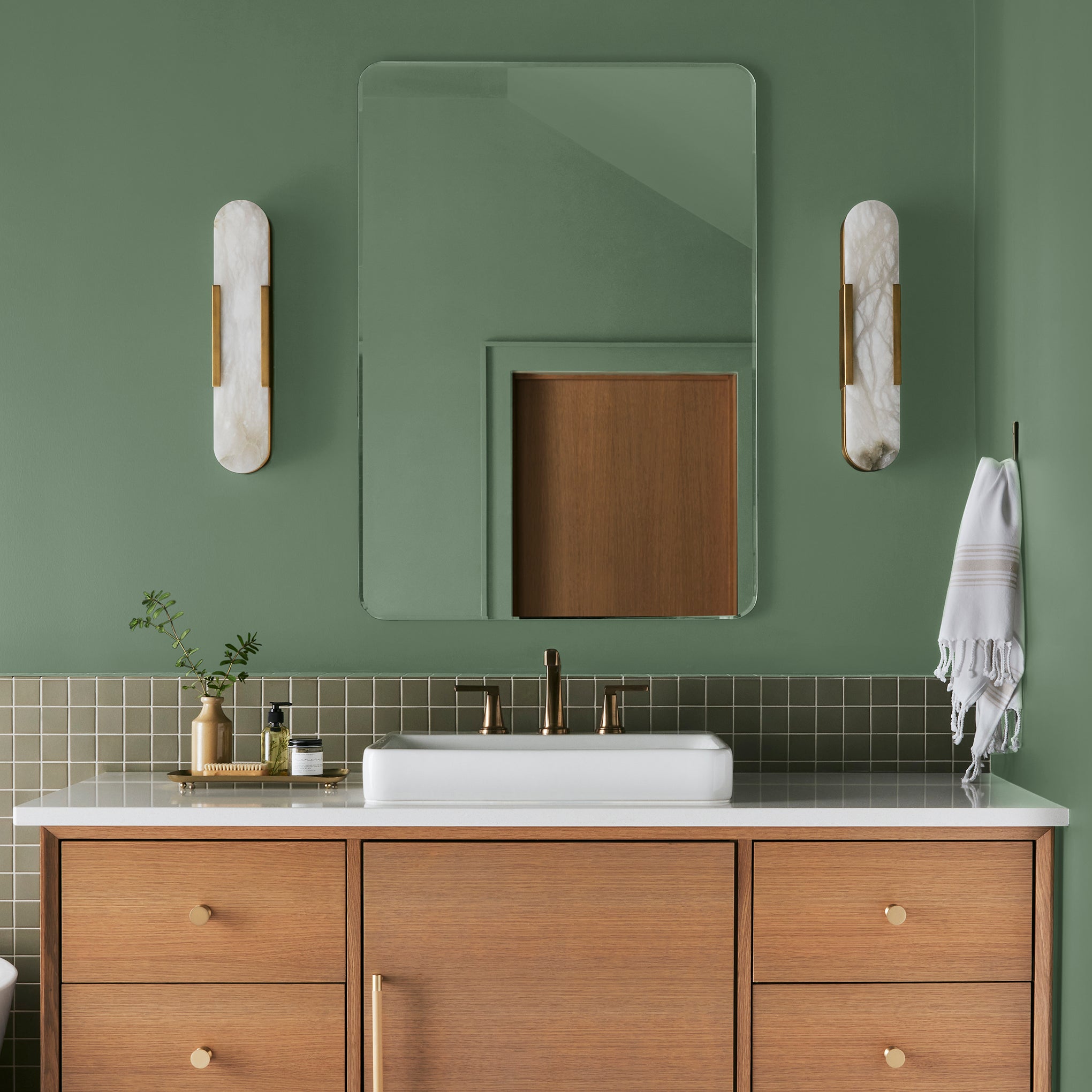 evergreen green paint named Magnoliass green shown painted on bathroom wall