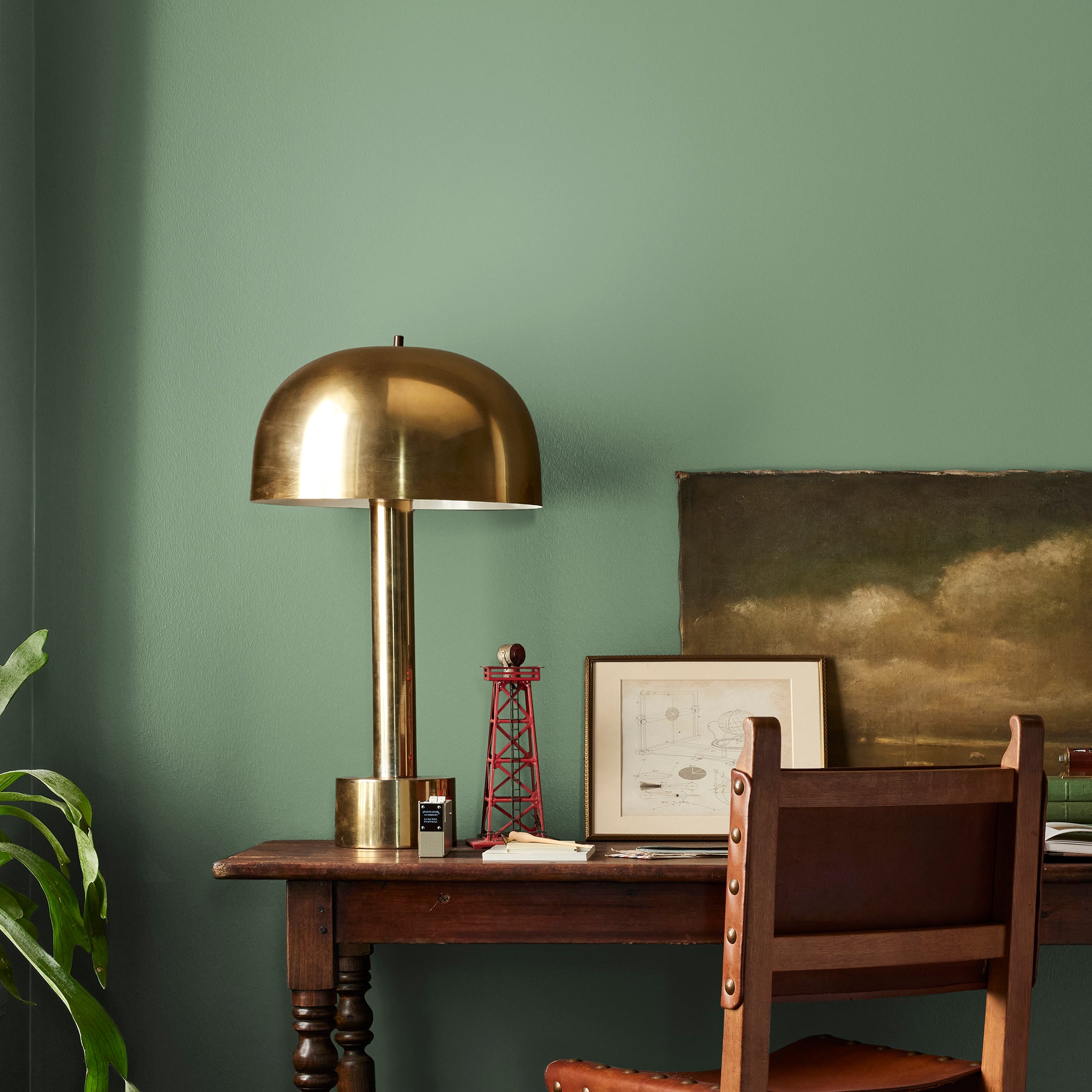 evergreen green paint named Magnoliass green shown painted on bedroom wall