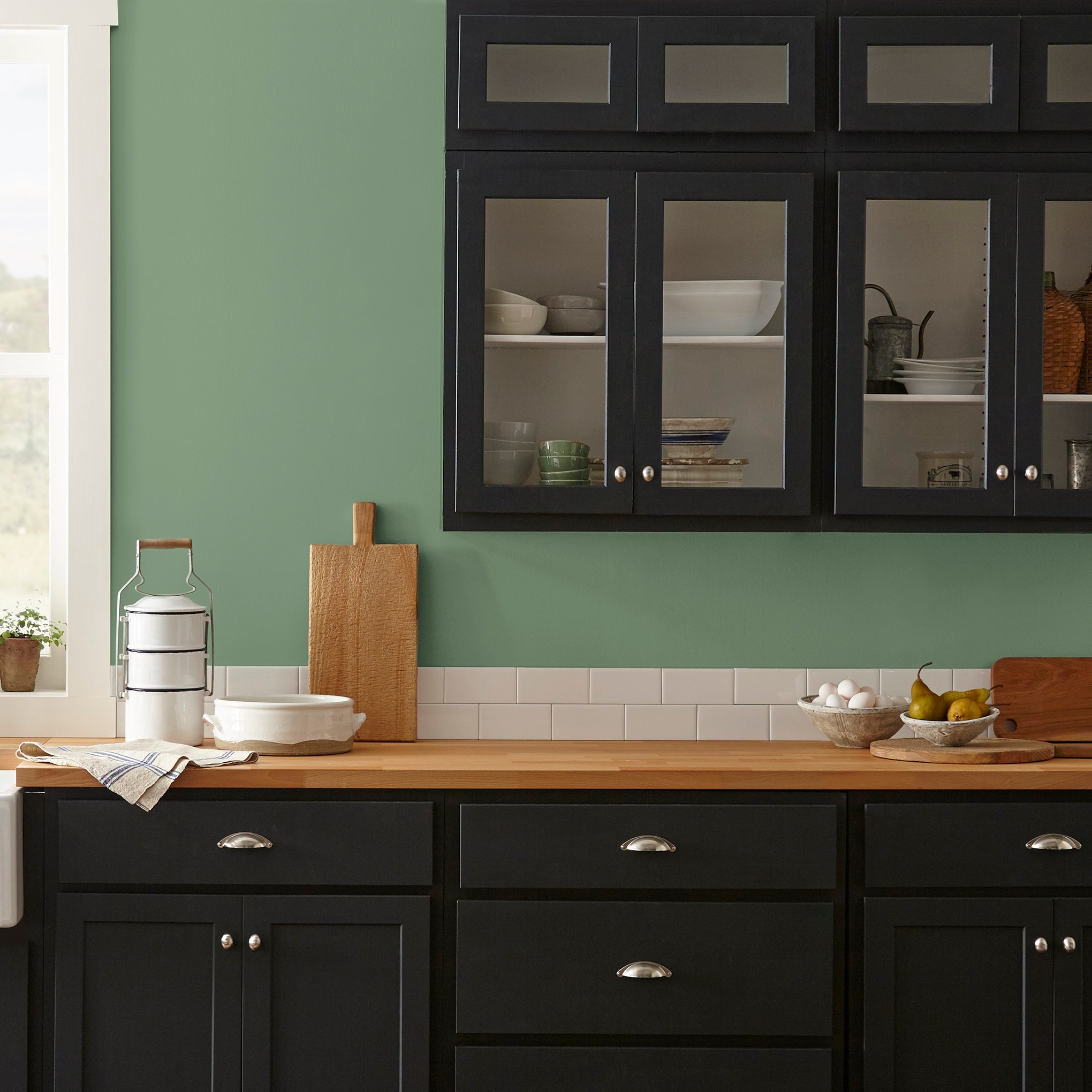 evergreen green paint named Magnoliass green shown painted on kitchen wall