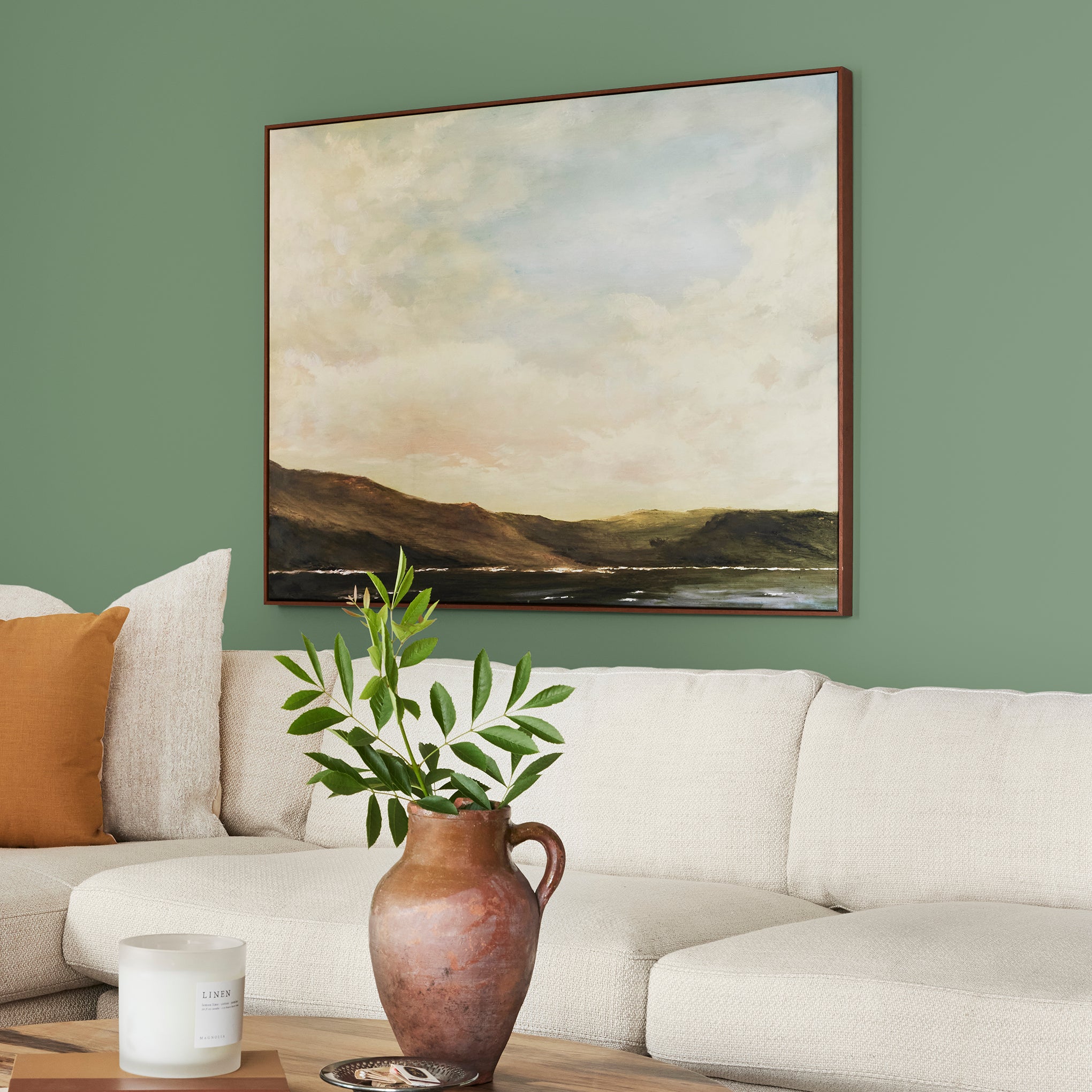 evergreen green paint named Magnoliass green shown painted on living room wall