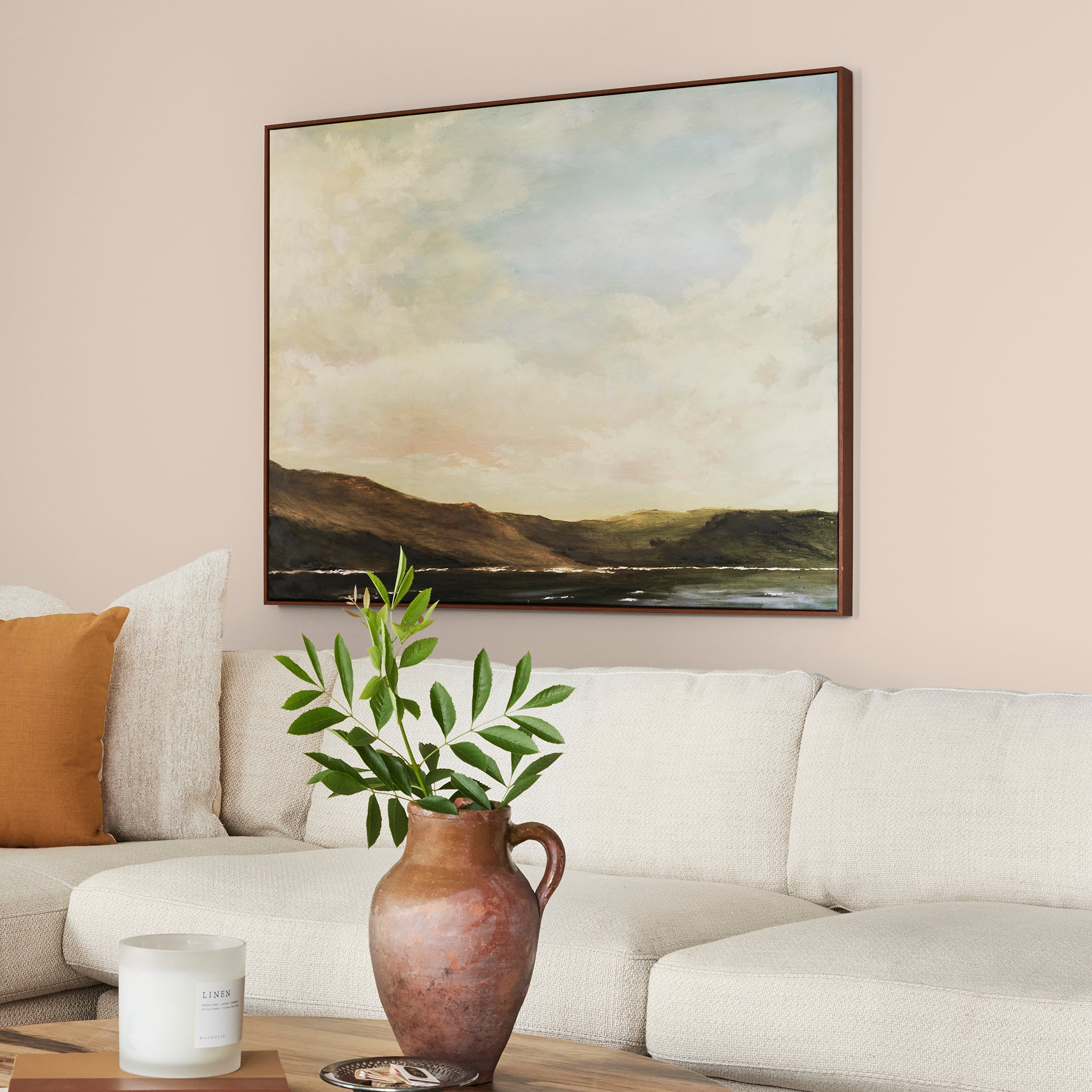 Warm soft peach interior paint named dutch tulip shown painted on living room wall