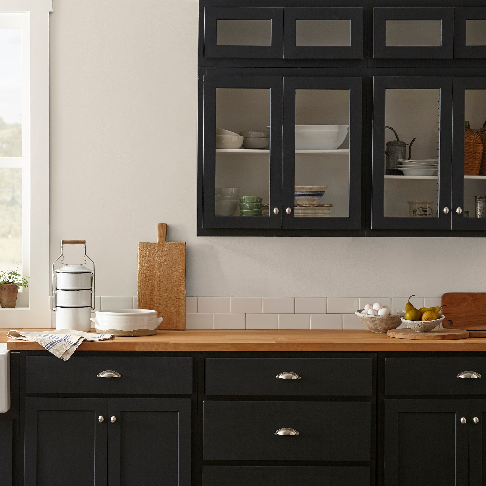 Oatmeal white with peach undertones interior paint named soft linen shown painted on kitchen wall