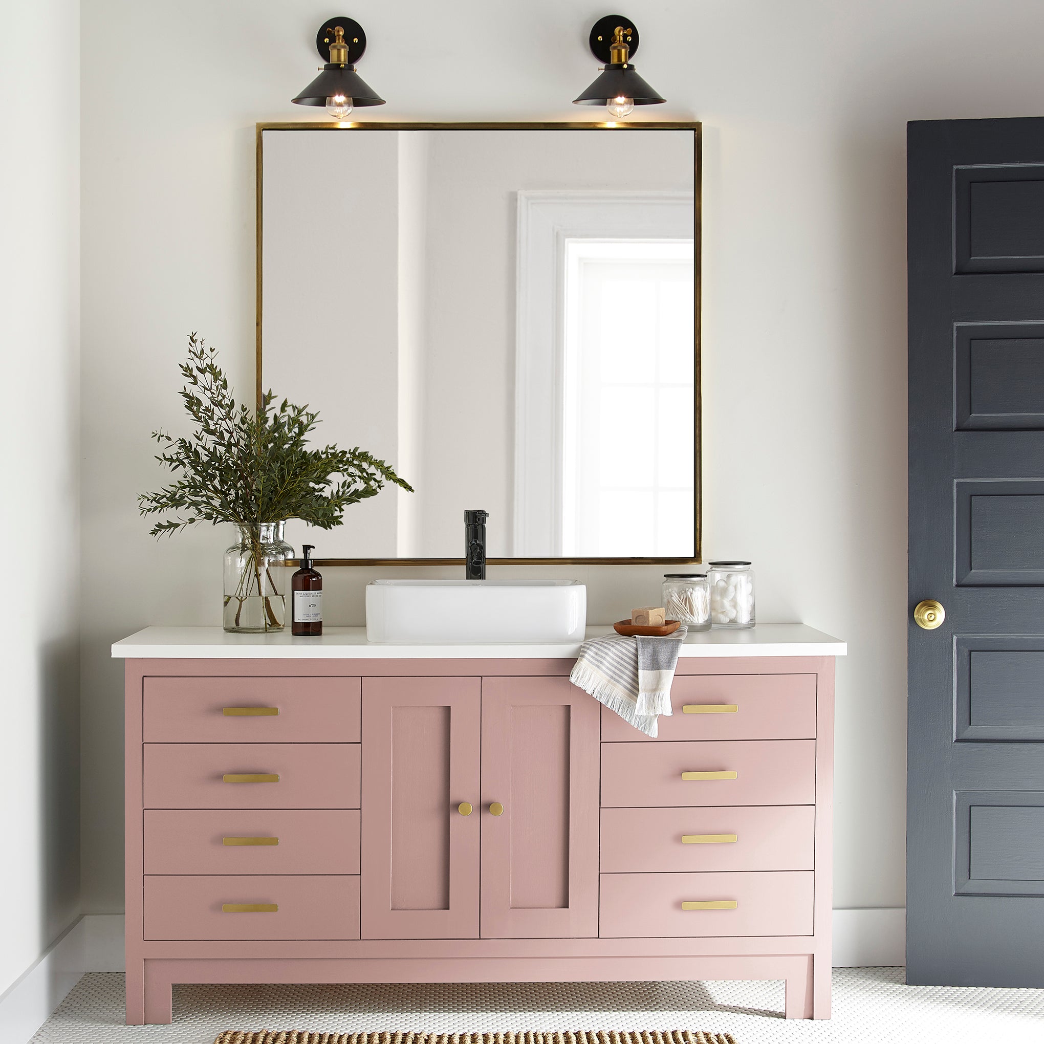 light pink trim, door and cabinetry paint named cabbage rose shown painted on bathroom cabinet