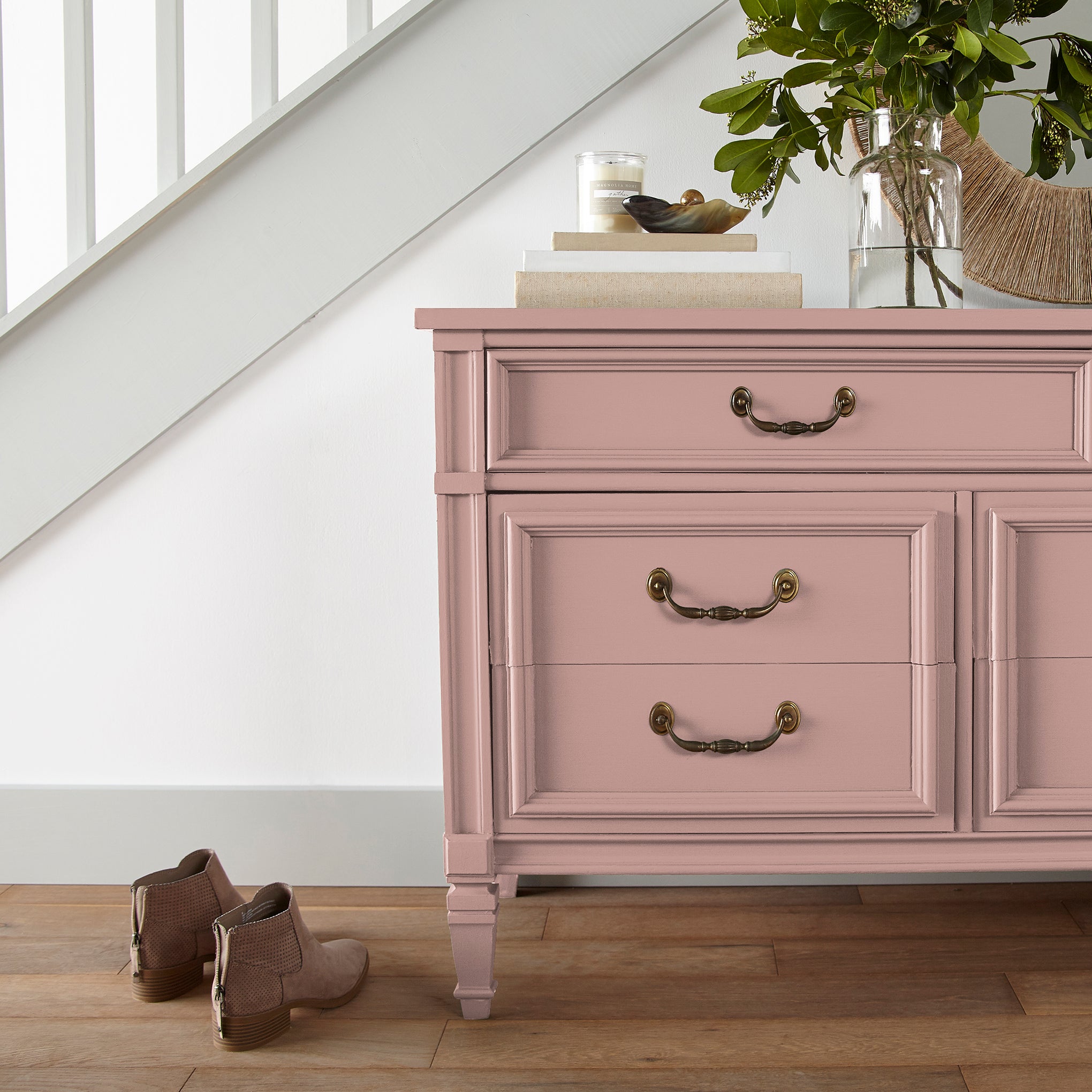 light pink trim, door and cabinetry paint named cabbage rose shown painted on entryway cabinet
