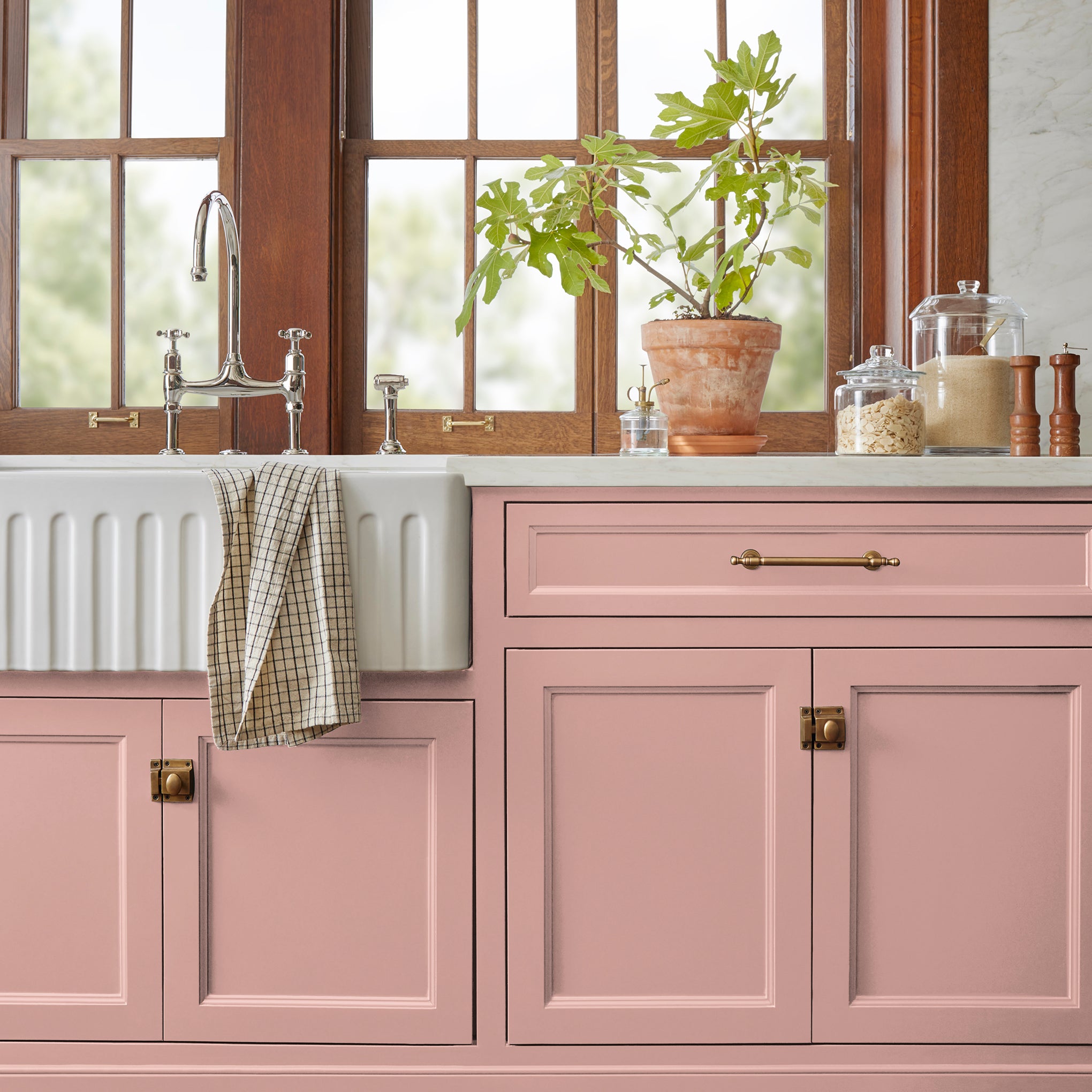 light pink trim, door and cabinetry paint named cabbage rose shown painted on kitchen cabinet
