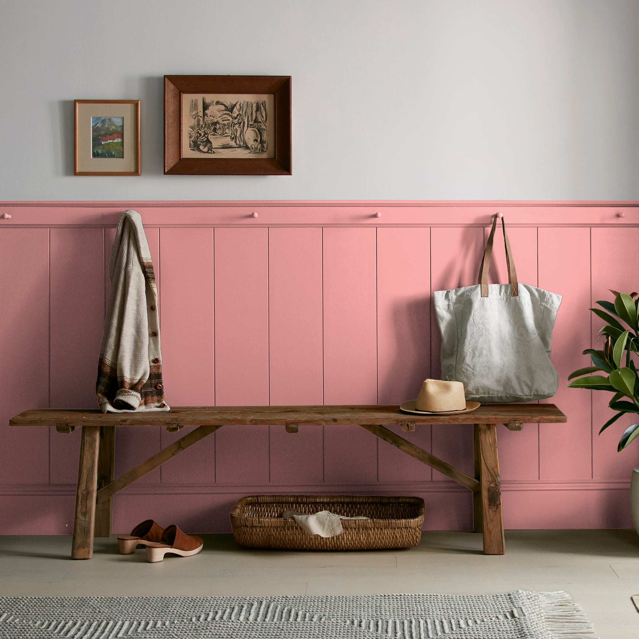 Coral pink interior paint named pink lemonade shown painted on entryway wall