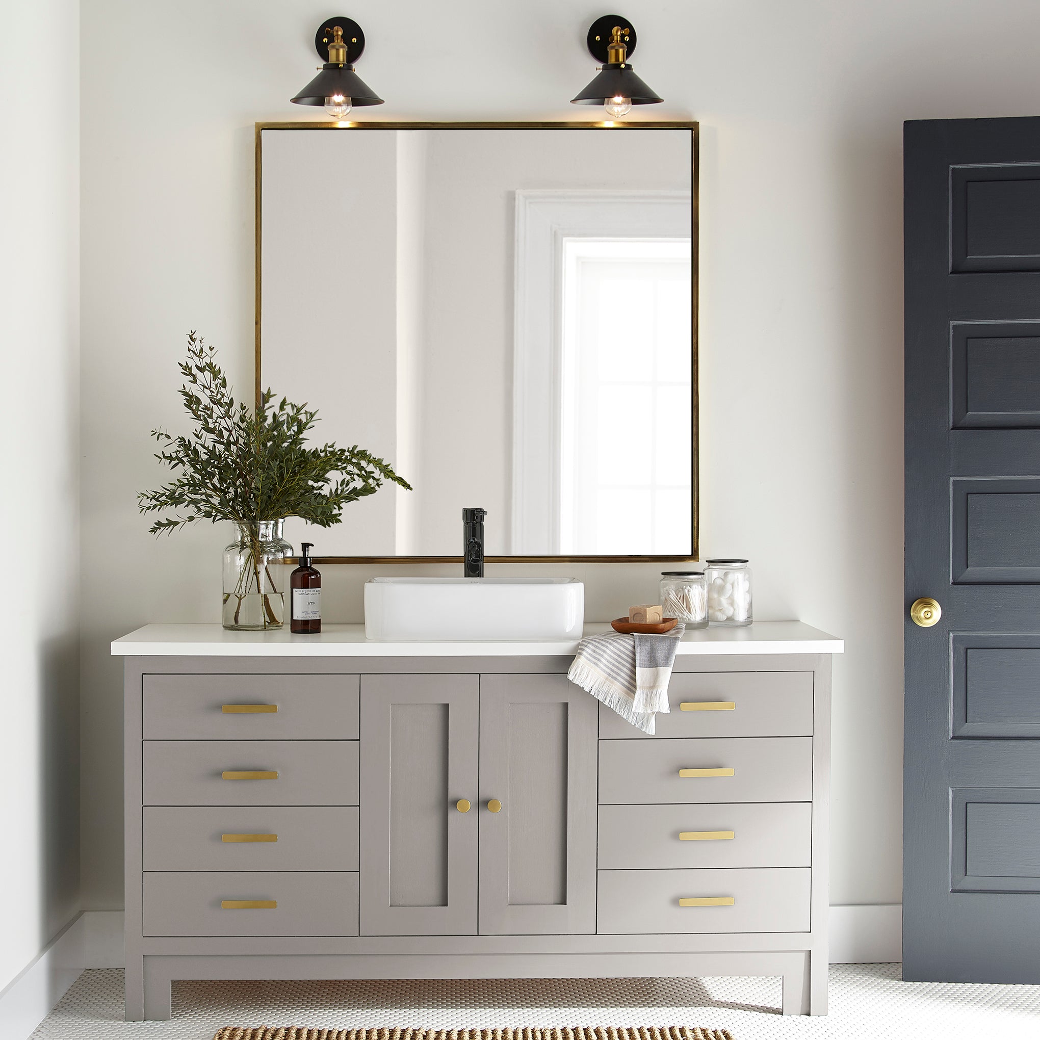A mid-toned taupe door and cabinet paint named timeless look shown painted on bathroom cabinet