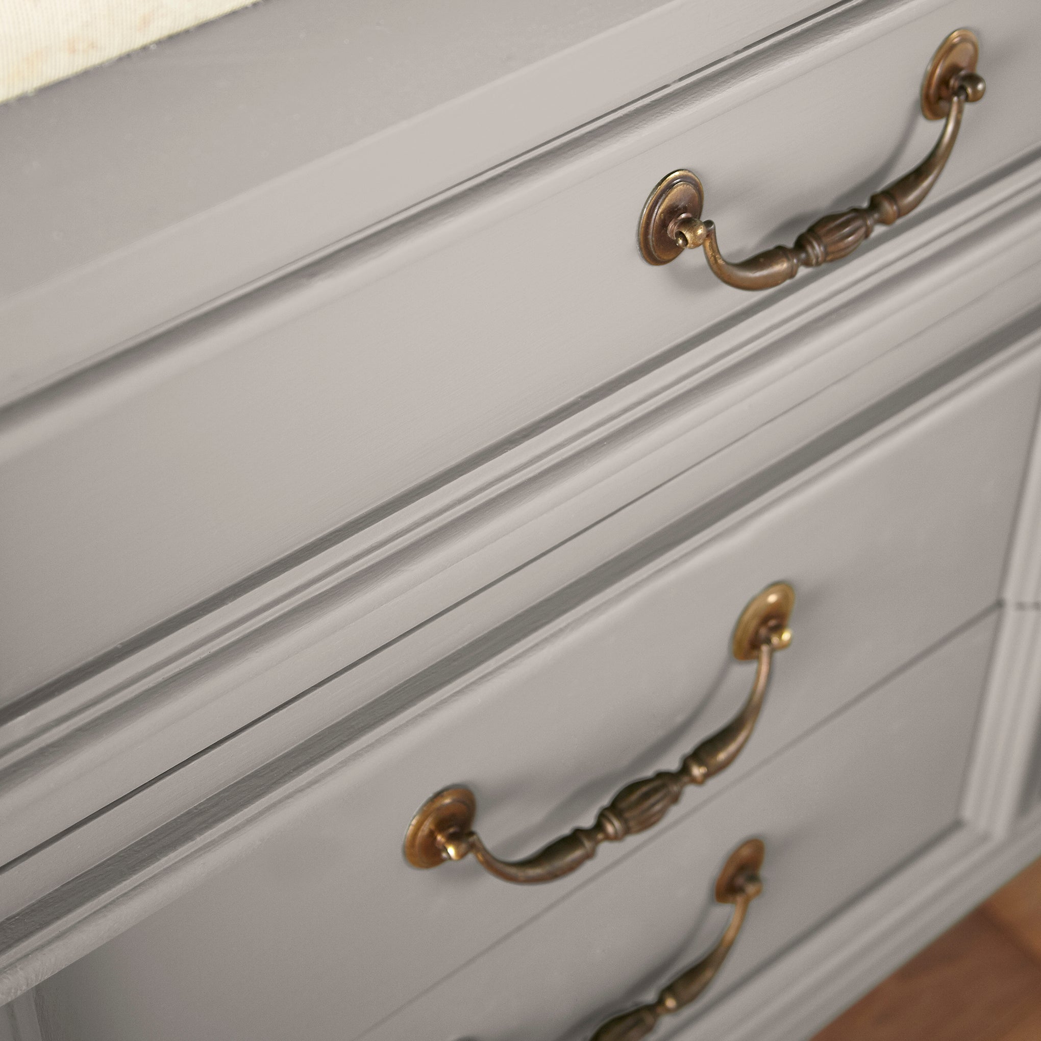 A mid-toned taupe door and cabinet paint named timeless look shown painted on cabinet