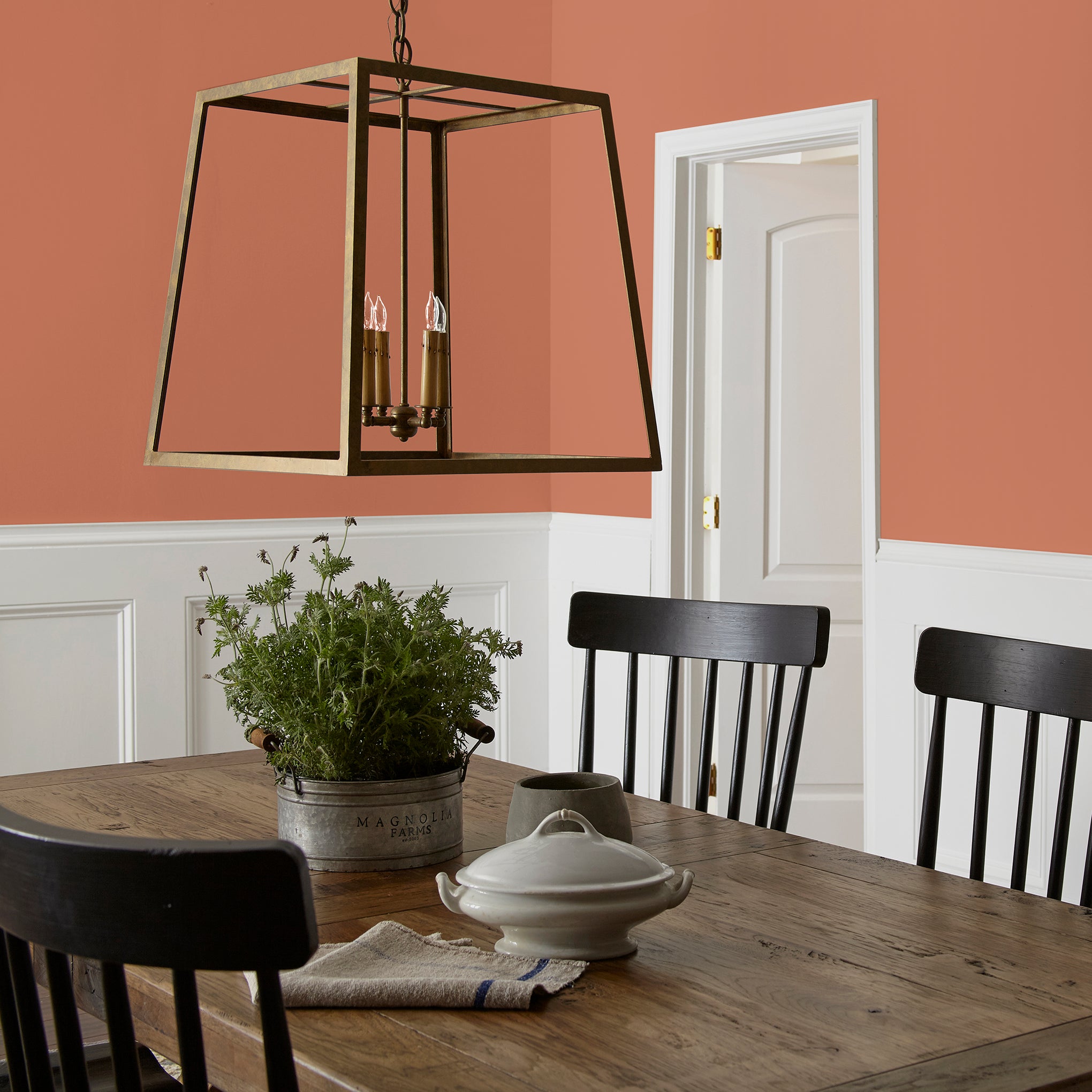 burnt orange paint named work worn wood shown painted on dining room wall