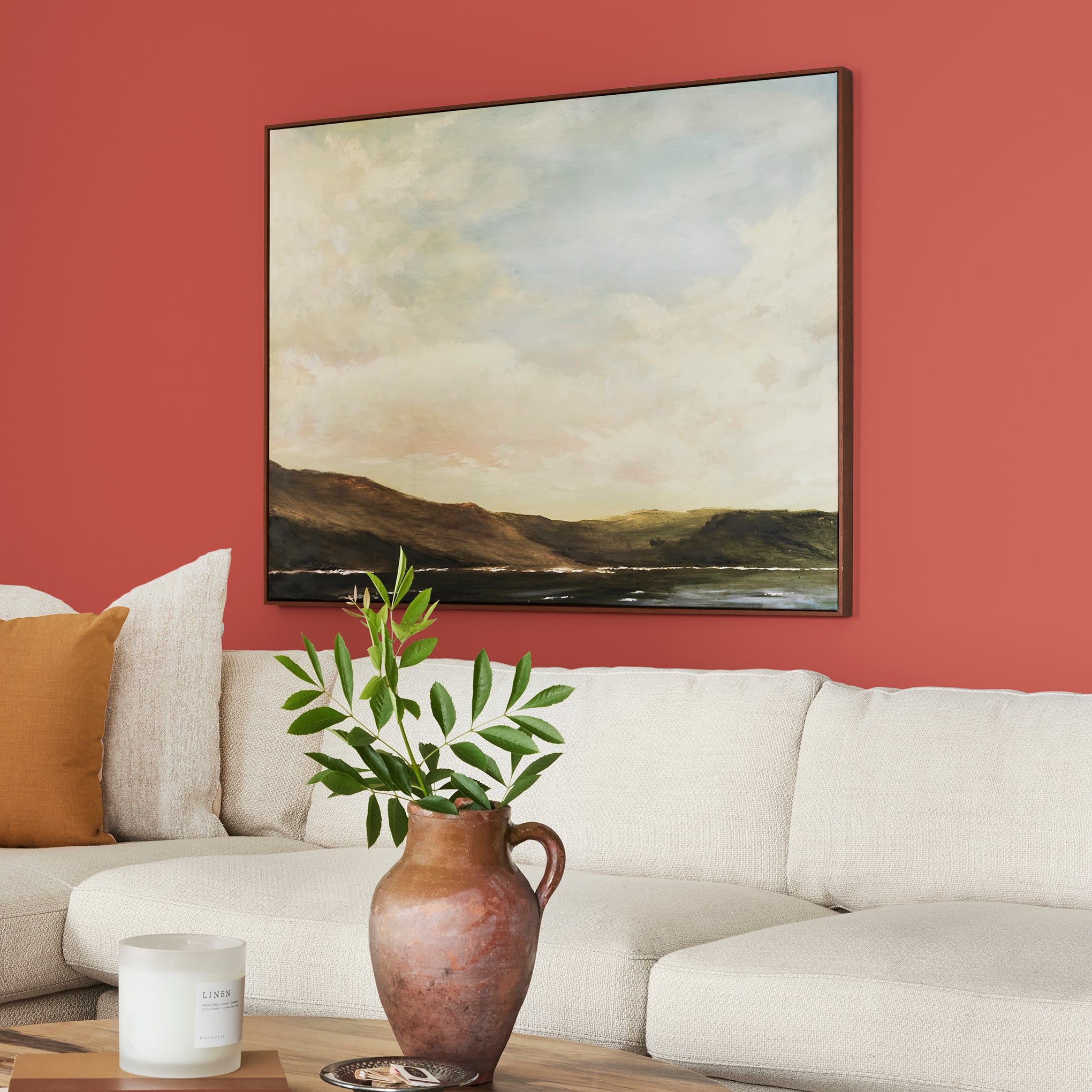 Bright red interior paint named hopscotch shown painted on living room wall
