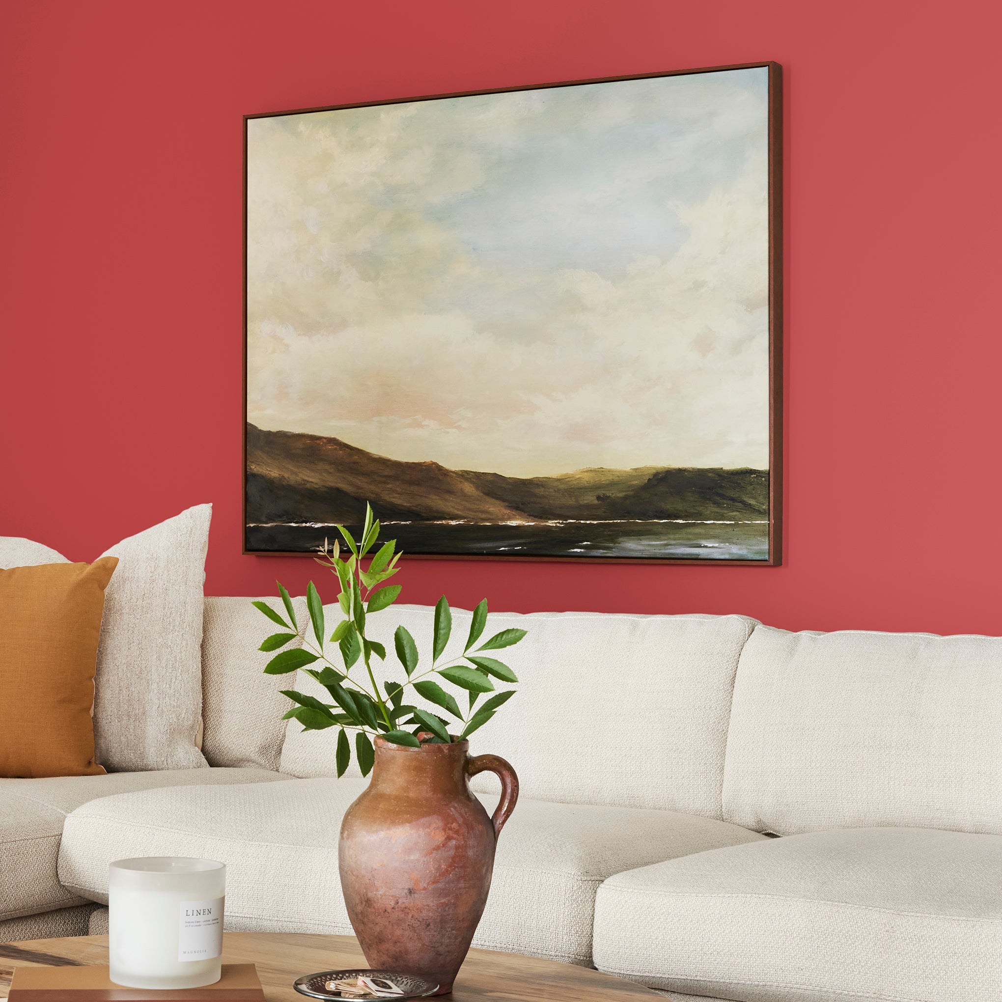 Bright pomegranate red interior paint named brave and bold shown painted on living room wall
