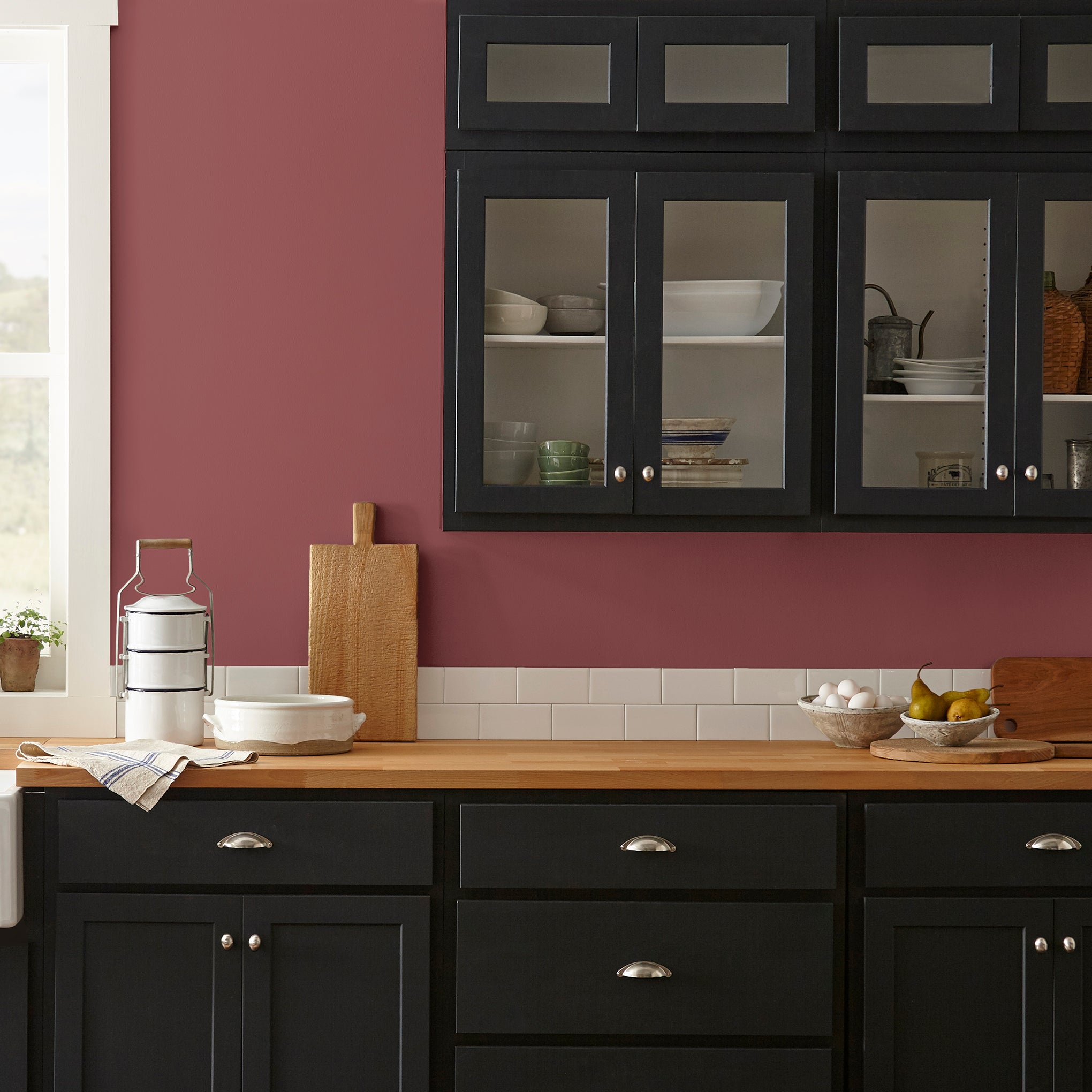 Deep antique red interior paint named by the fireplace shown painted on kitchen wall