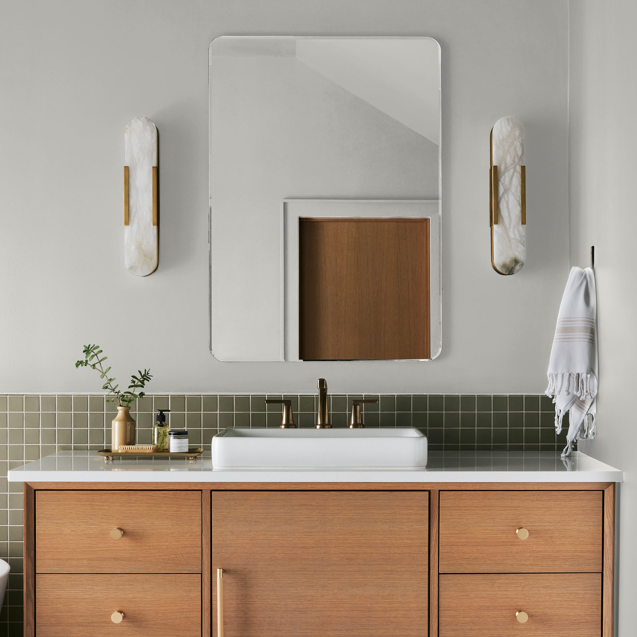 Crisp white with beige interior paint named panna cotta shown painted on bathroom wall