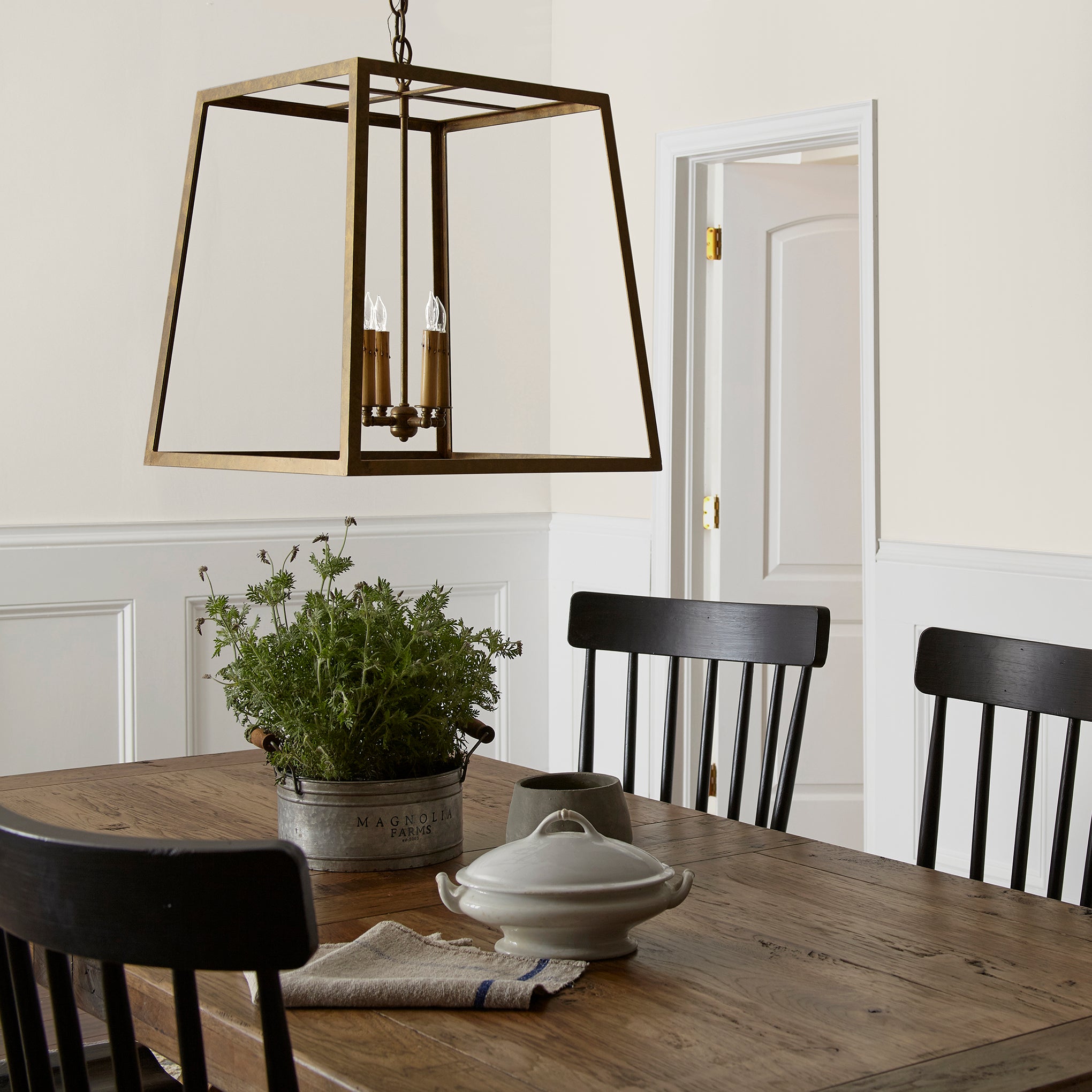 Warm white with beige hues interior paint named silos white shown painted on dining room wall