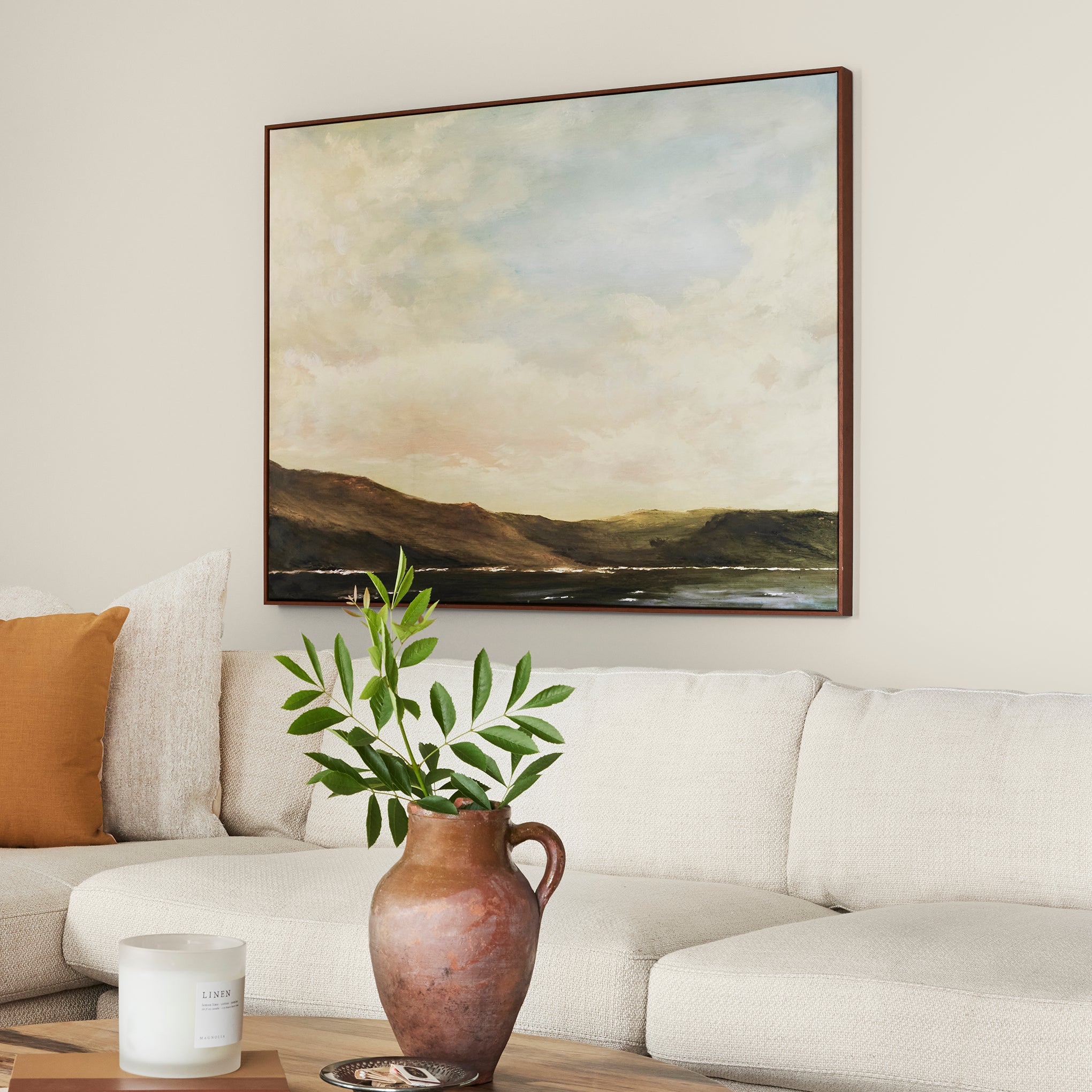 A bleached beige interior paint named pearly cotton shown painted on living room wall
