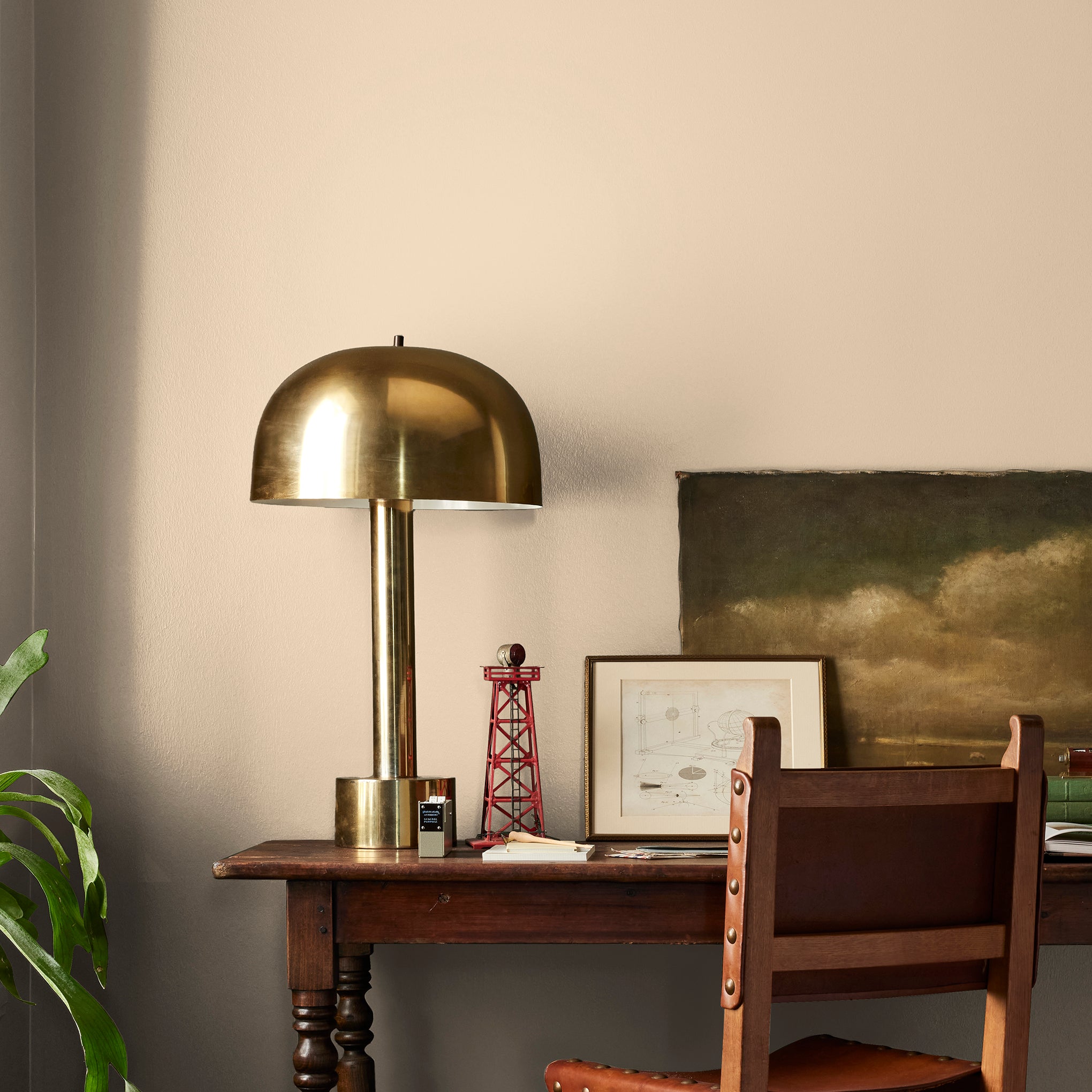 pastel yellow-beige paint named ambient light shown painted on bedroom wall