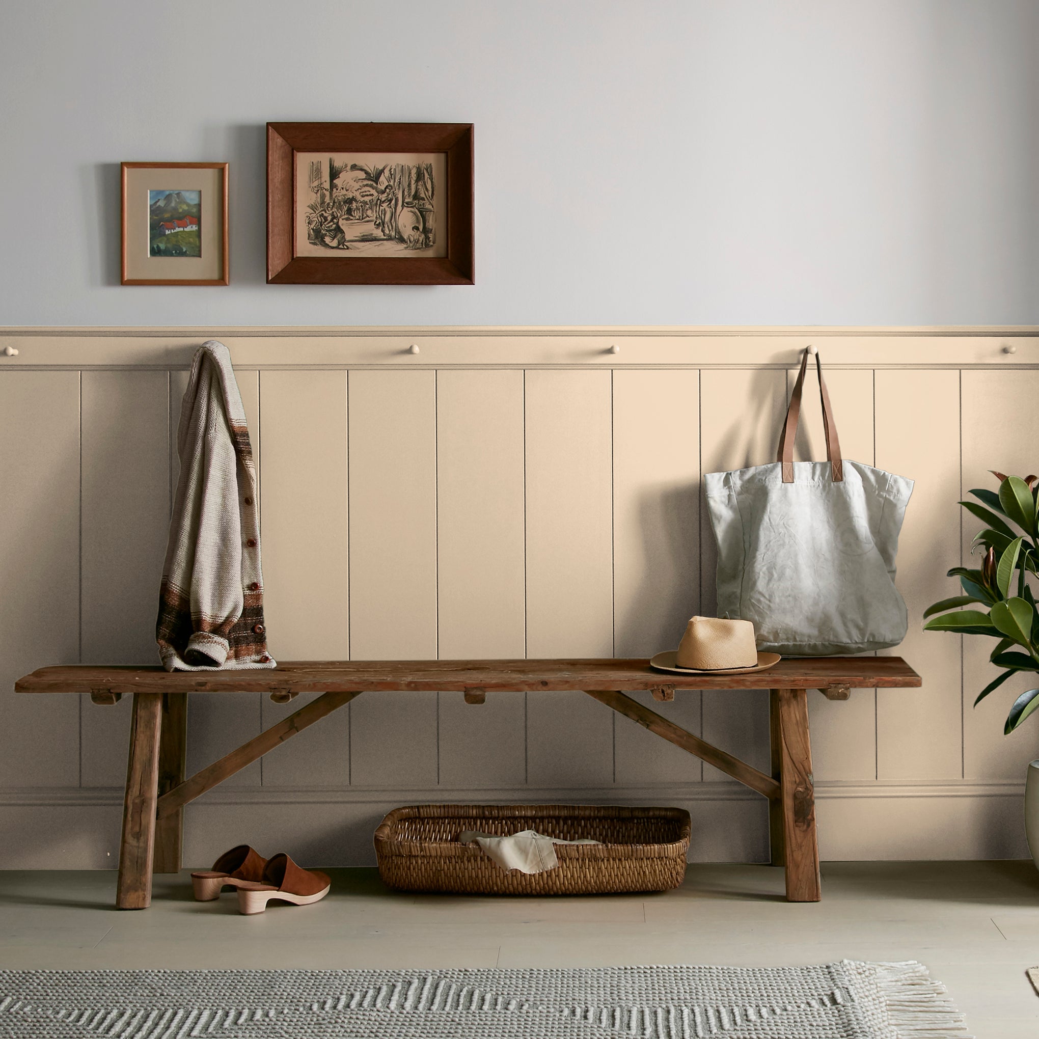 pastel yellow-beige paint named ambient light shown painted on entryway wall