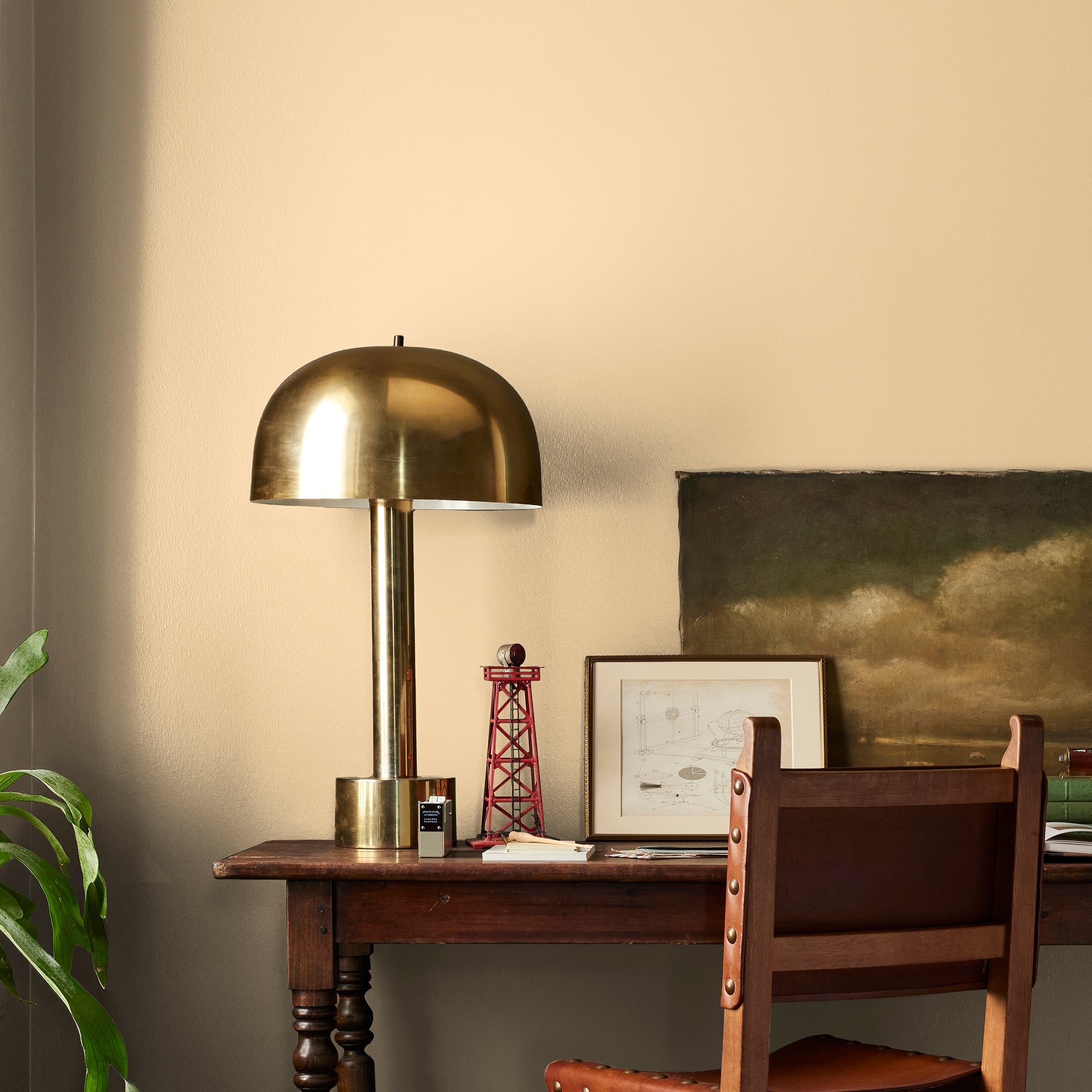 Creamy honey and citrus yellow interior paint named lemony shown painted on bedroom wall
