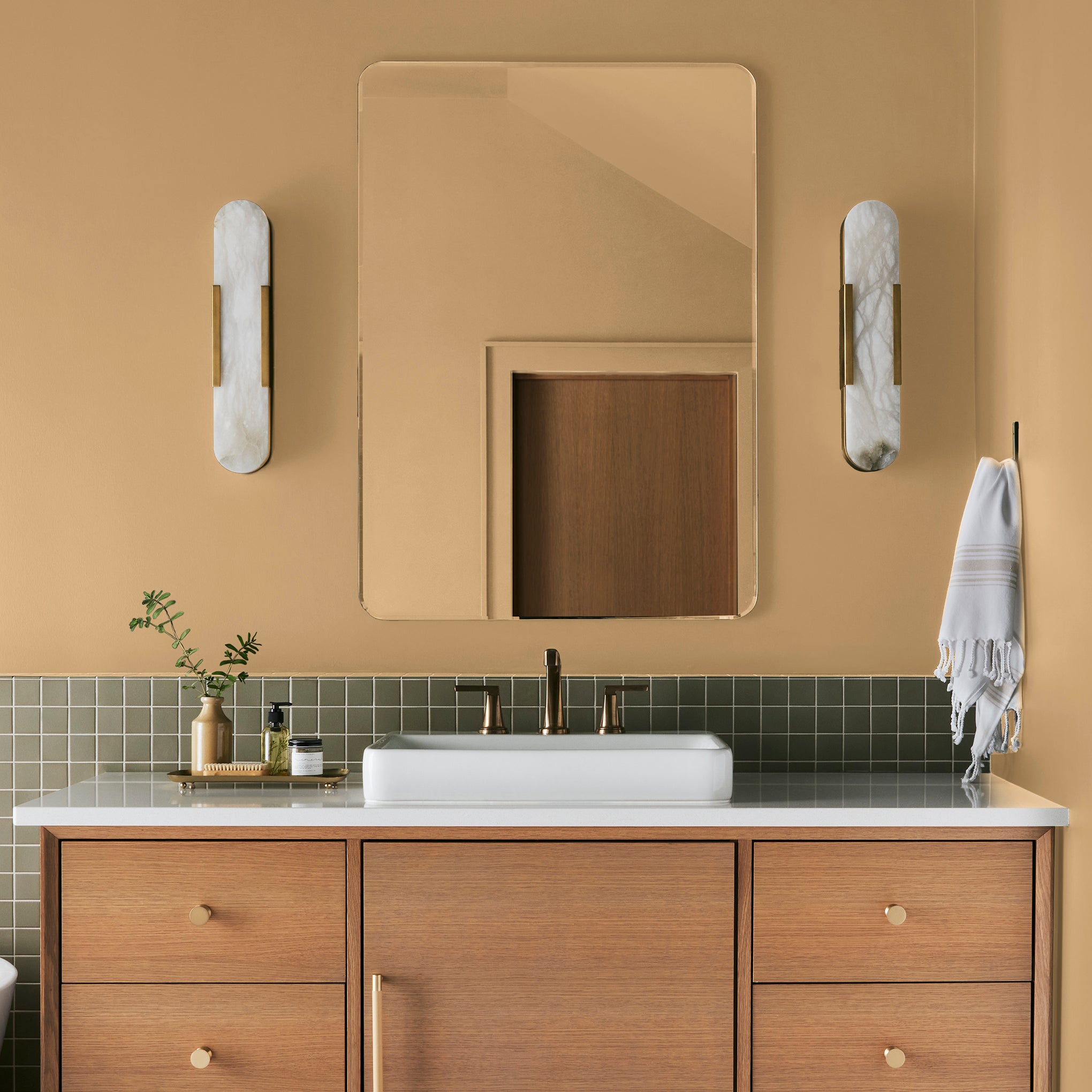 golden-yellow classic interior paint named amber shown painted on bathroom wall