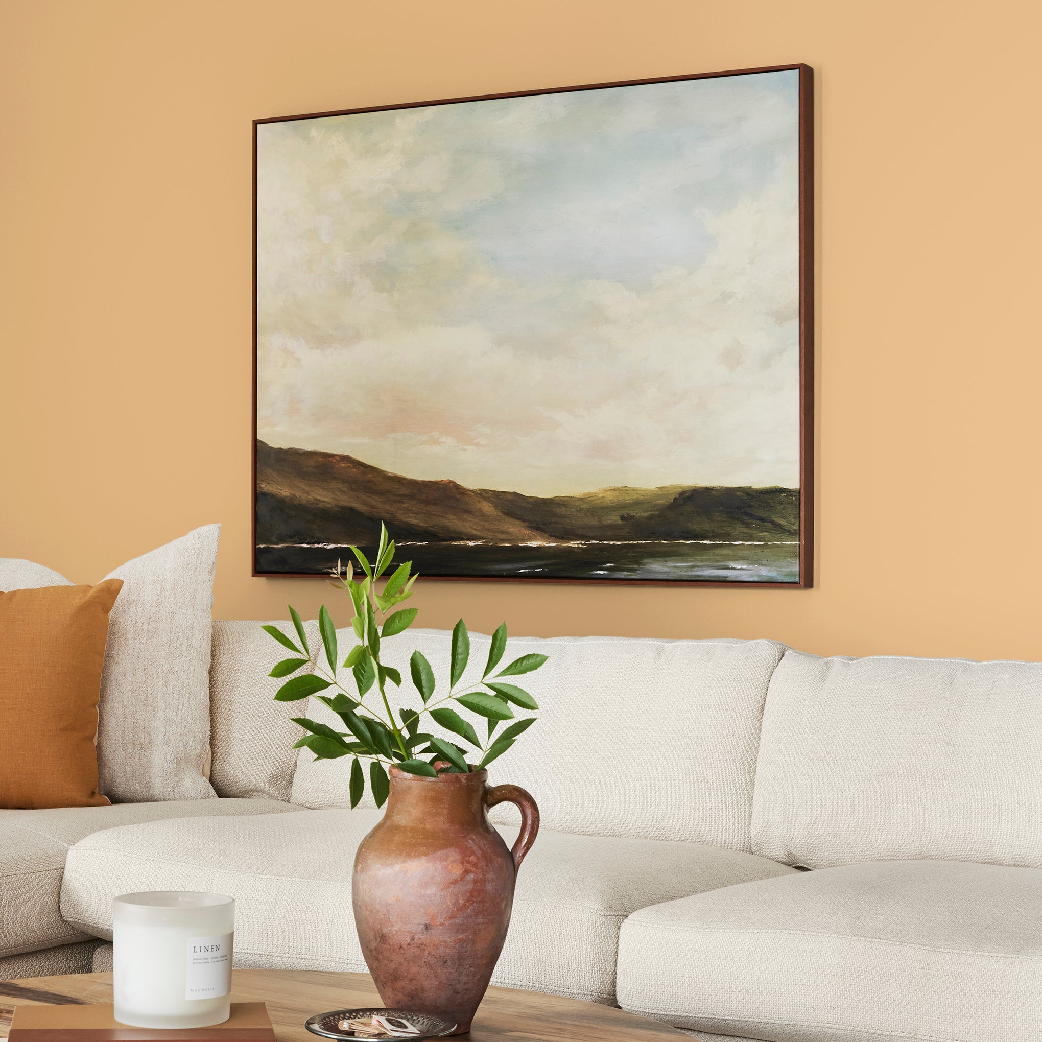 golden-yellow classic interior paint named amber shown painted on living room wall