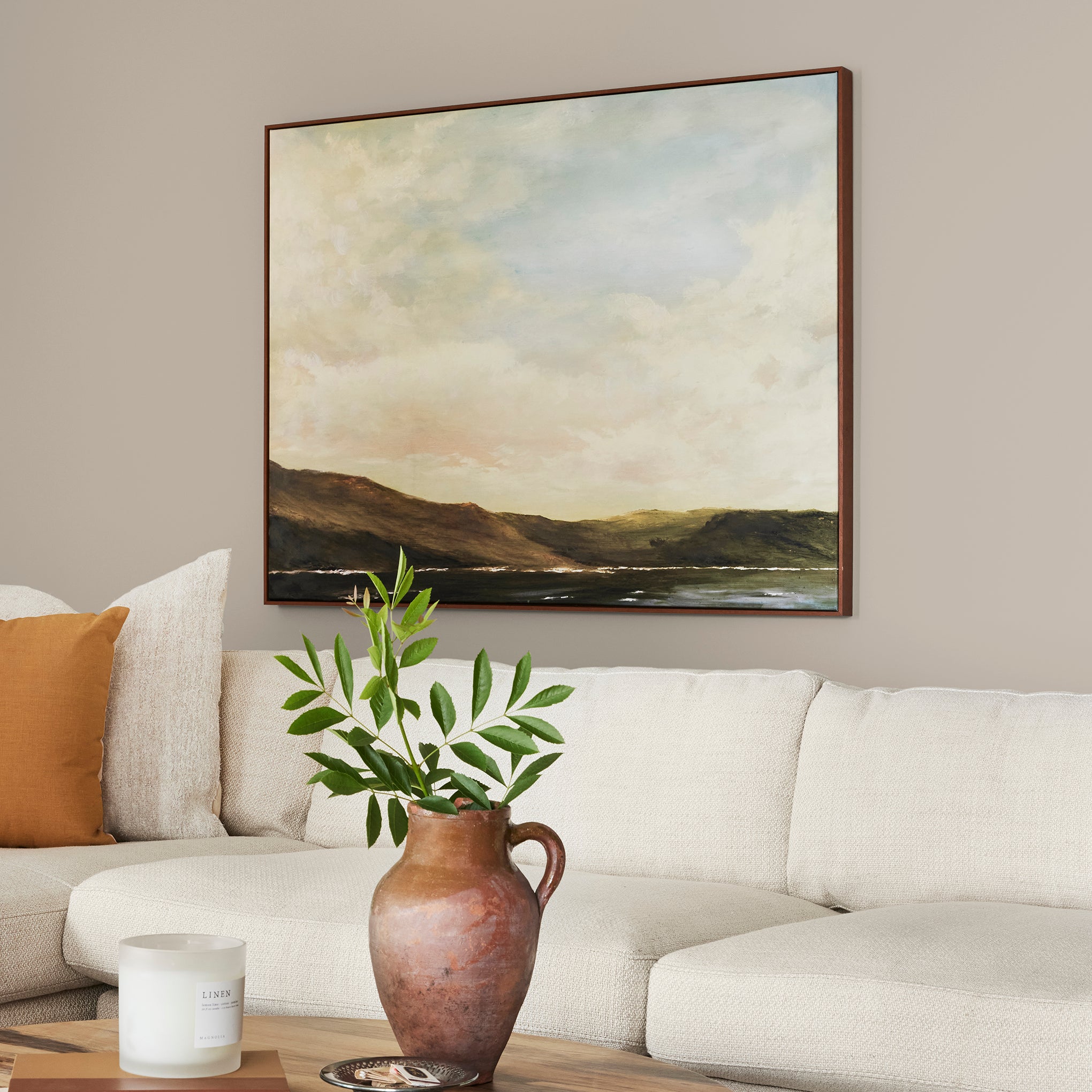 A khaki beige interior paint named solid wood shown painted on living room wall