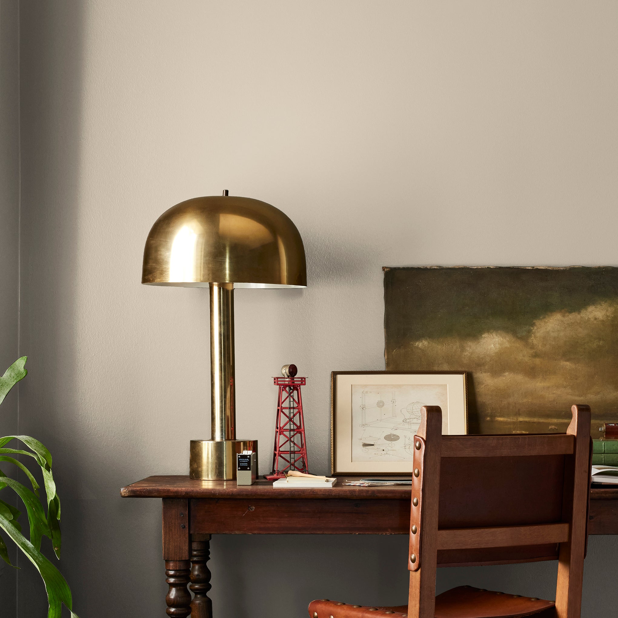 Cool beige dusted with hazel and cocoa interior paint named tapestry thread shown painted on bedroom wall