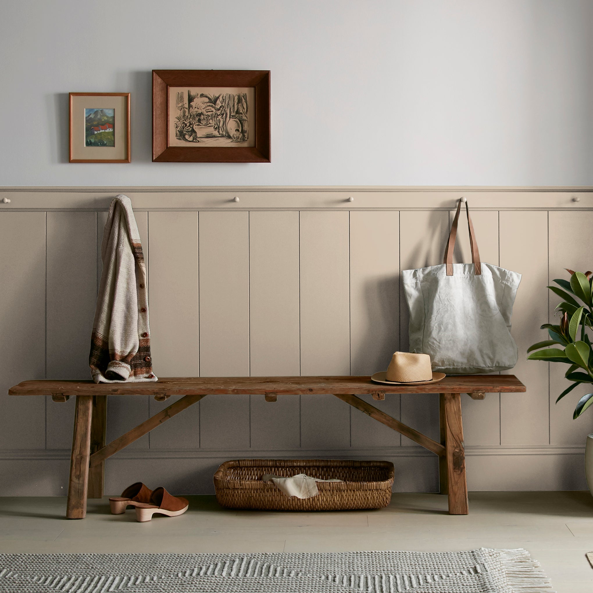 Tan and beige with notes of honey interior paint named embossed letter shown painted on entryway wall