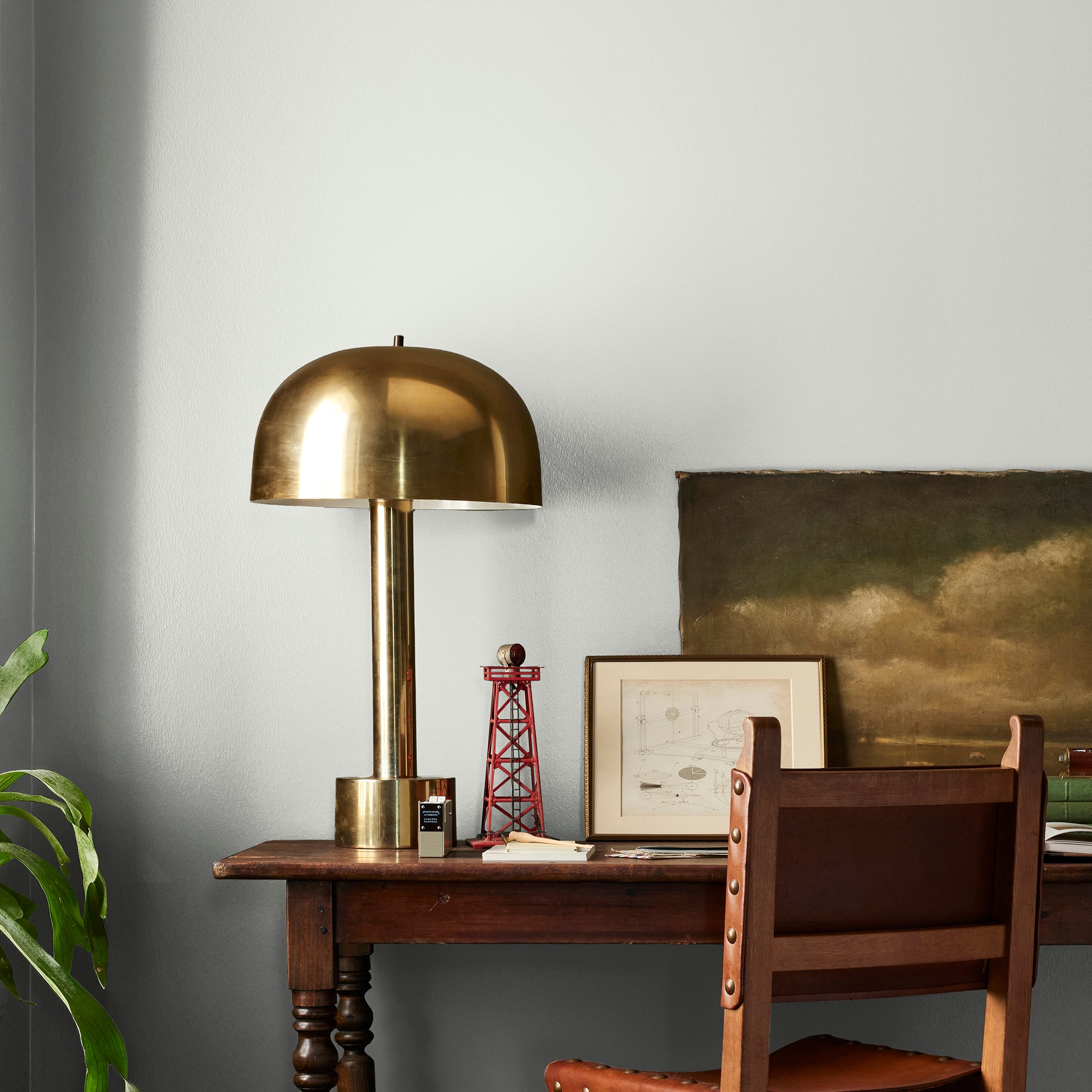 Almost white with gray and green undertones interior paint named chime gray shown painted on bedroom wall