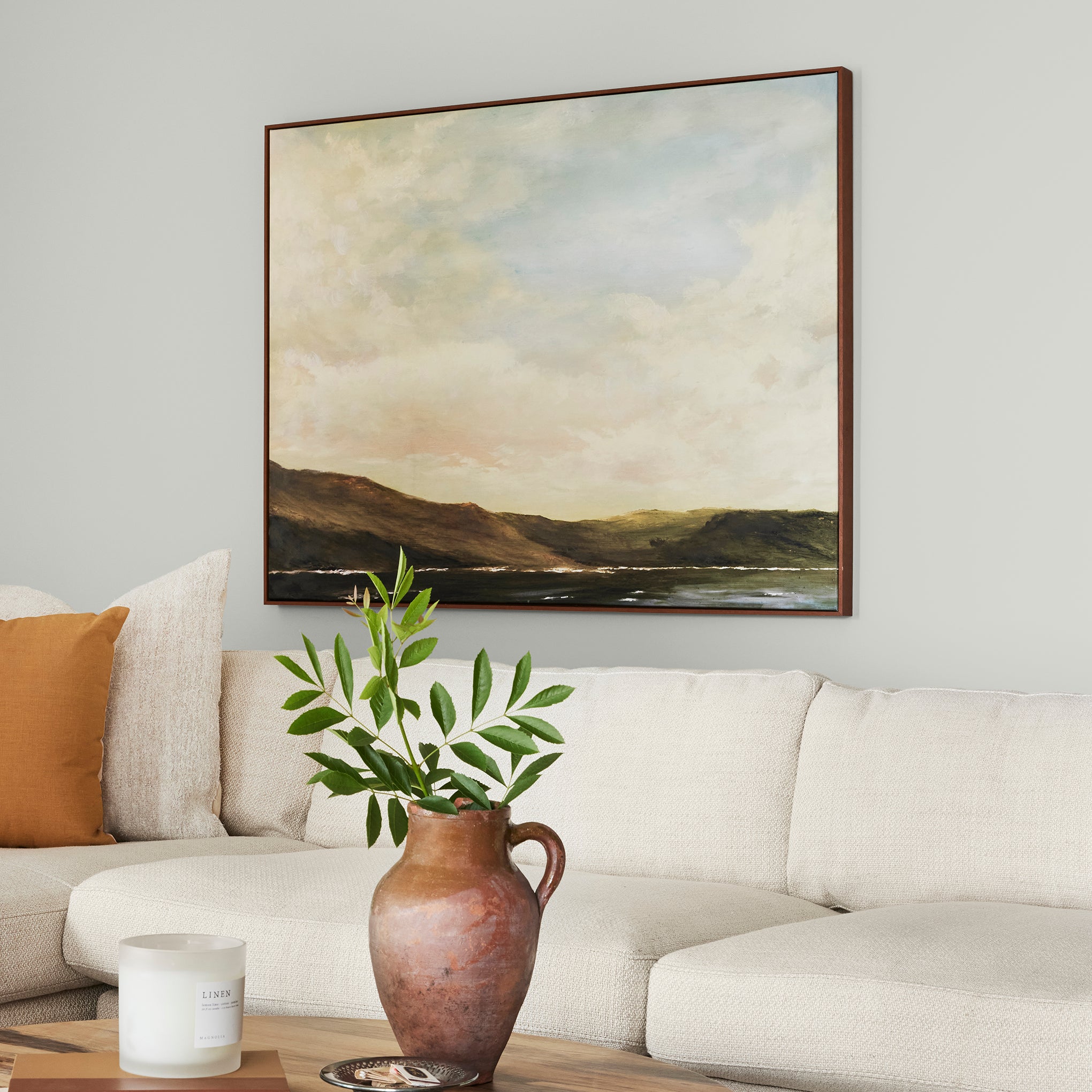 Almost white with gray and green undertones interior paint named chime gray shown painted on living room wall