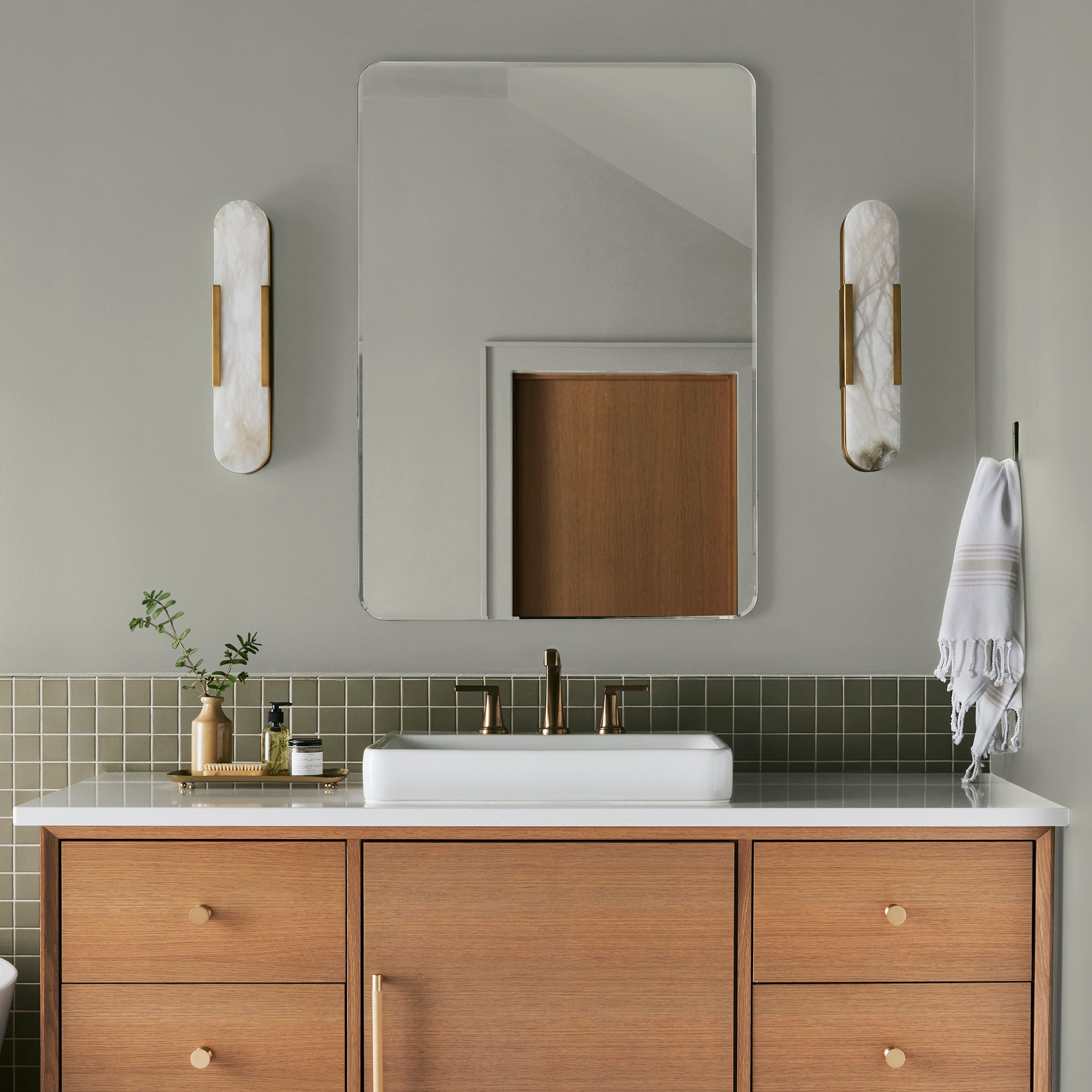 Creamy mint green interior paint named clean lines shown painted on bathroom wall