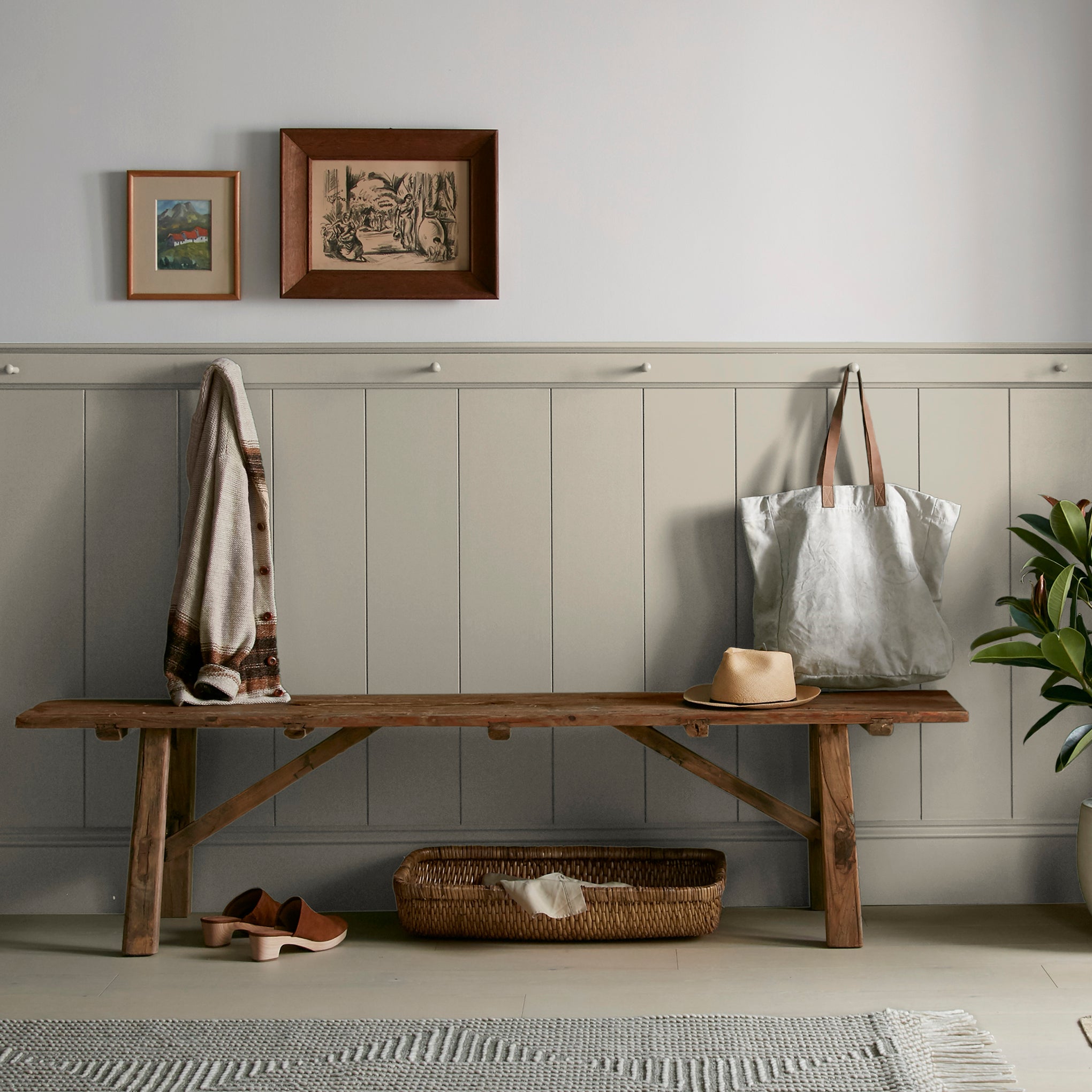 Muted apple green with gray accents interior paint named seasonal shown painted on entryway wall