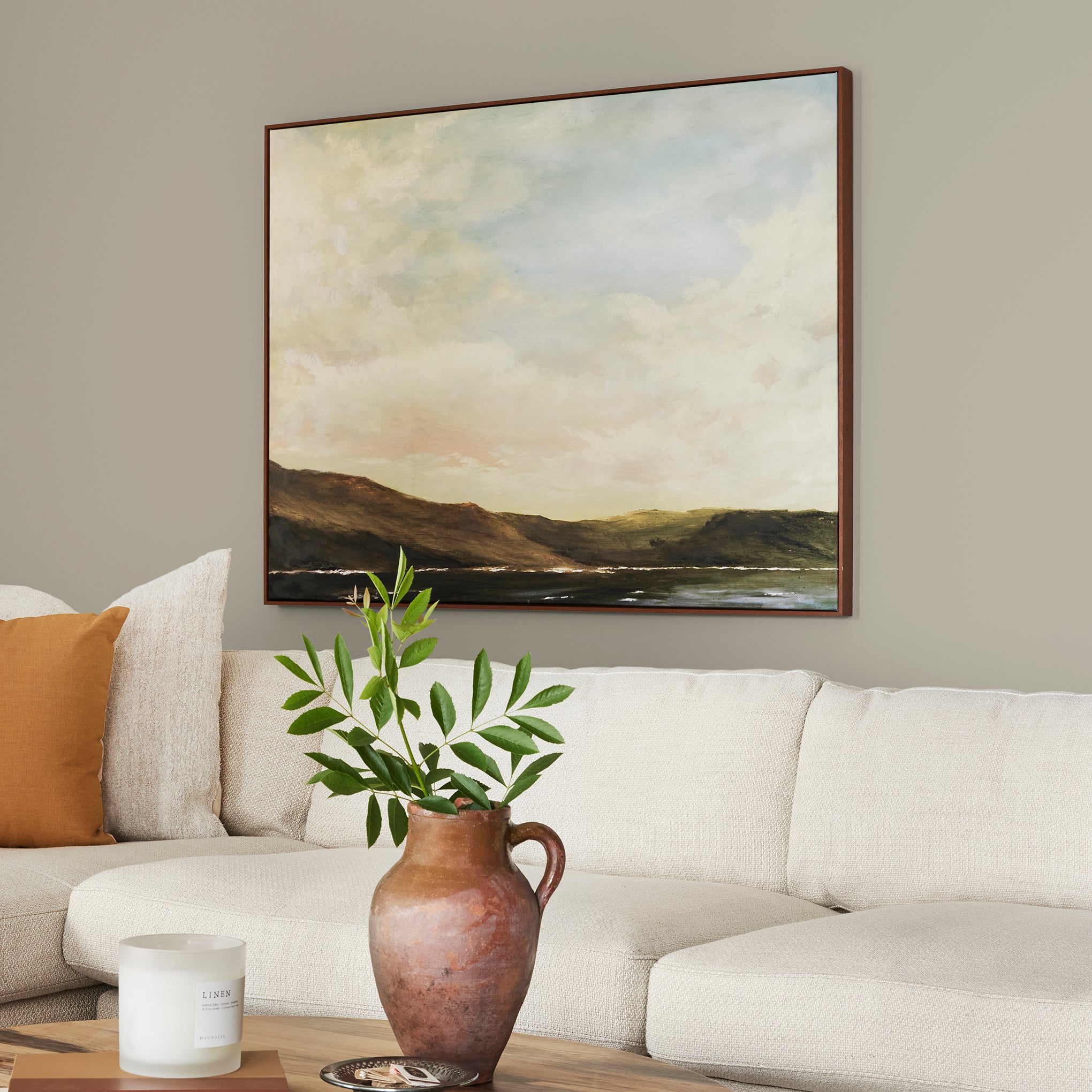 Muted apple green with gray accents interior paint named seasonal shown painted on living room wall